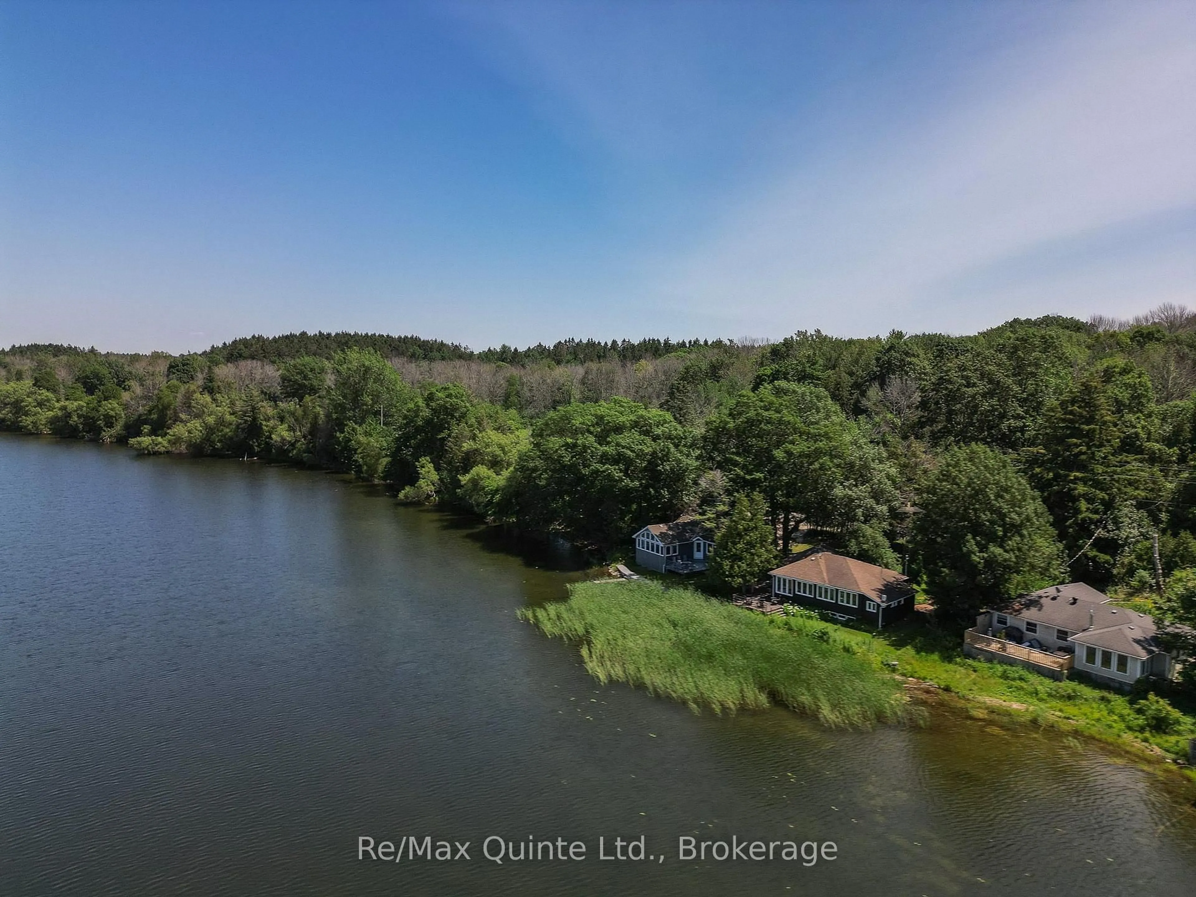 A pic from outside/outdoor area/front of a property/back of a property/a pic from drone, water/lake/river/ocean view for 14 Bayshore Rd, Brighton Ontario K0K 1H0