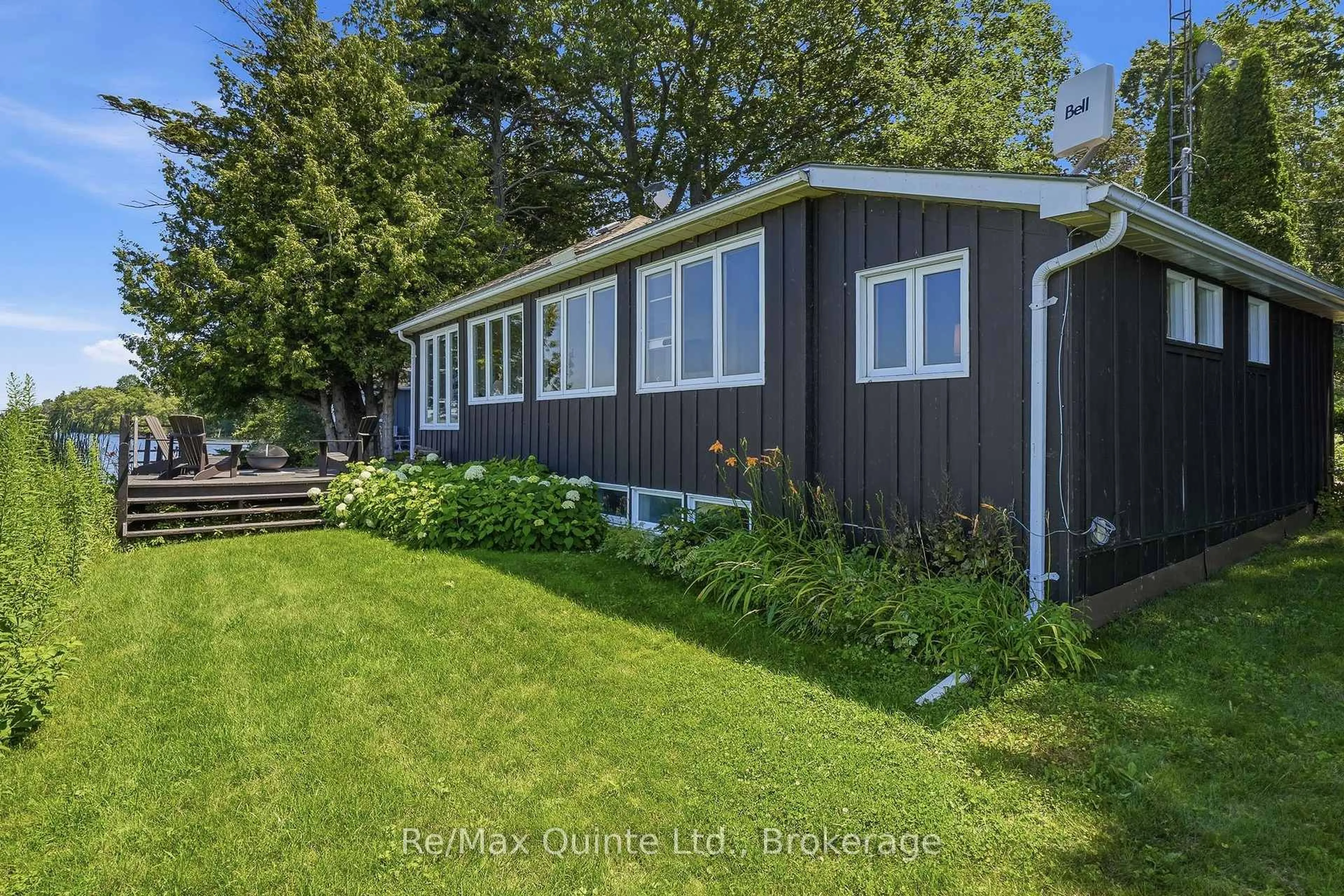 A pic from outside/outdoor area/front of a property/back of a property/a pic from drone, water/lake/river/ocean view for 14 Bayshore Rd, Brighton Ontario K0K 1H0