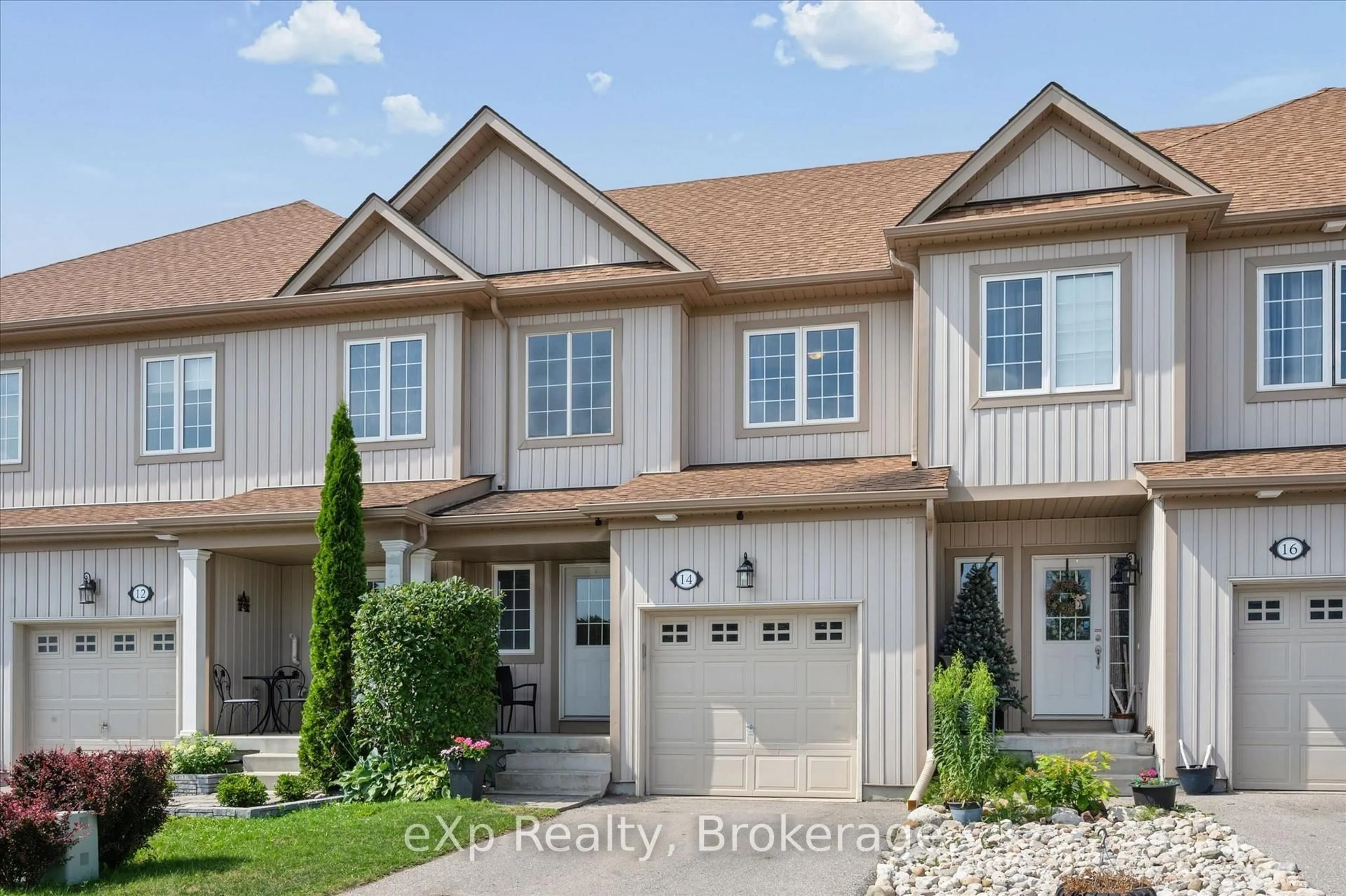 Home with vinyl exterior material, street for 14 Sadler St, Centre Wellington Ontario N1M 0E2