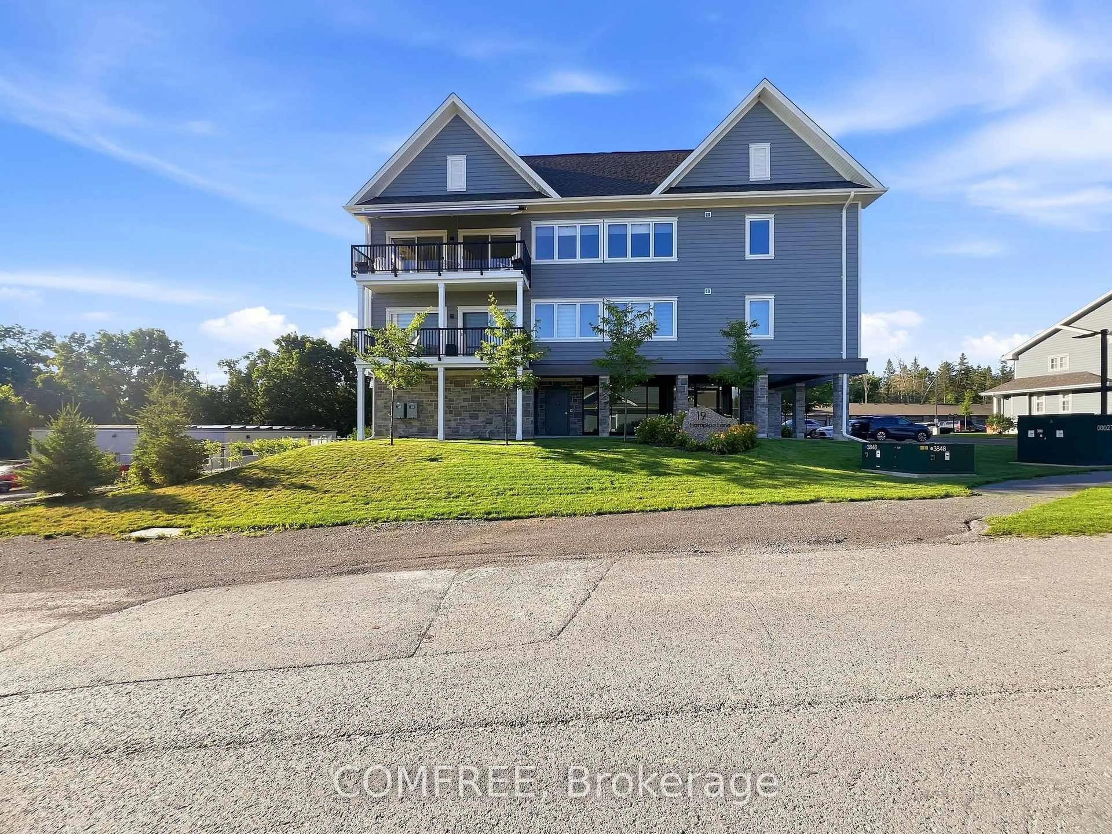 A pic from outside/outdoor area/front of a property/back of a property/a pic from drone, water/lake/river/ocean view for 19 Hampton Lane #301, Selwyn Ontario K0L 2H0