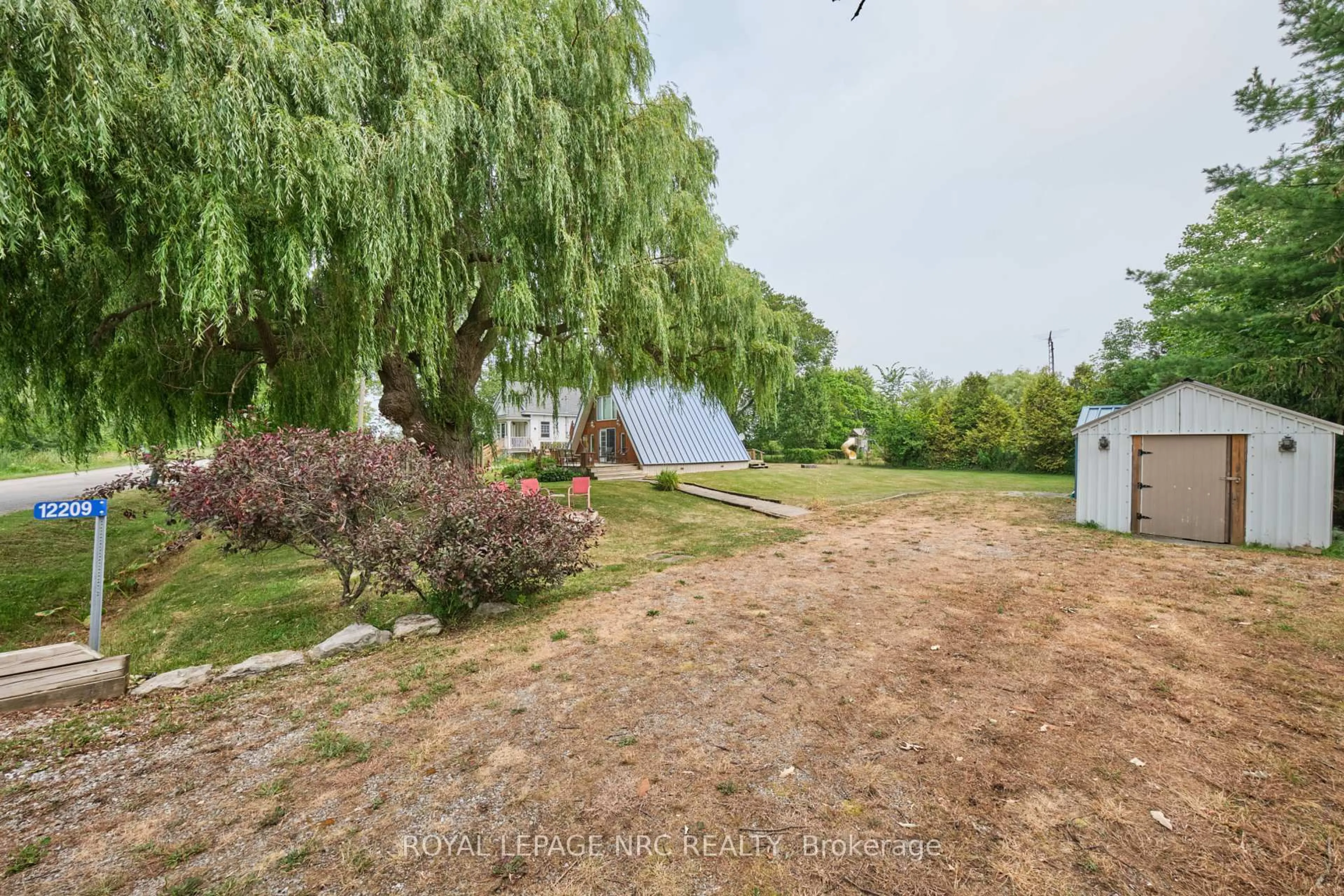 A pic from outside/outdoor area/front of a property/back of a property/a pic from drone, unknown for 12209 Brawn Rd, Wainfleet Ontario L0S 1V0