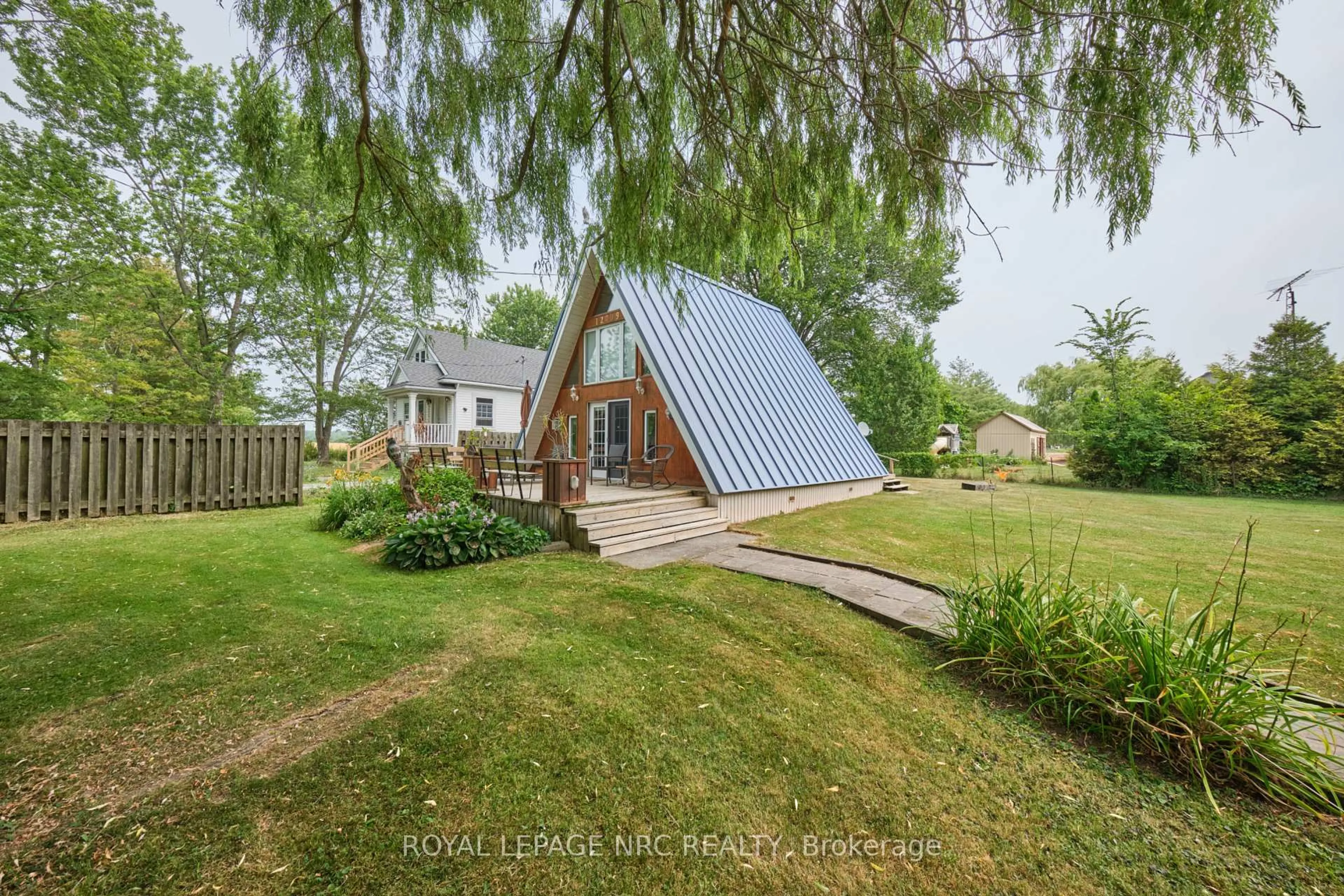 A pic from outside/outdoor area/front of a property/back of a property/a pic from drone, unknown for 12209 Brawn Rd, Wainfleet Ontario L0S 1V0