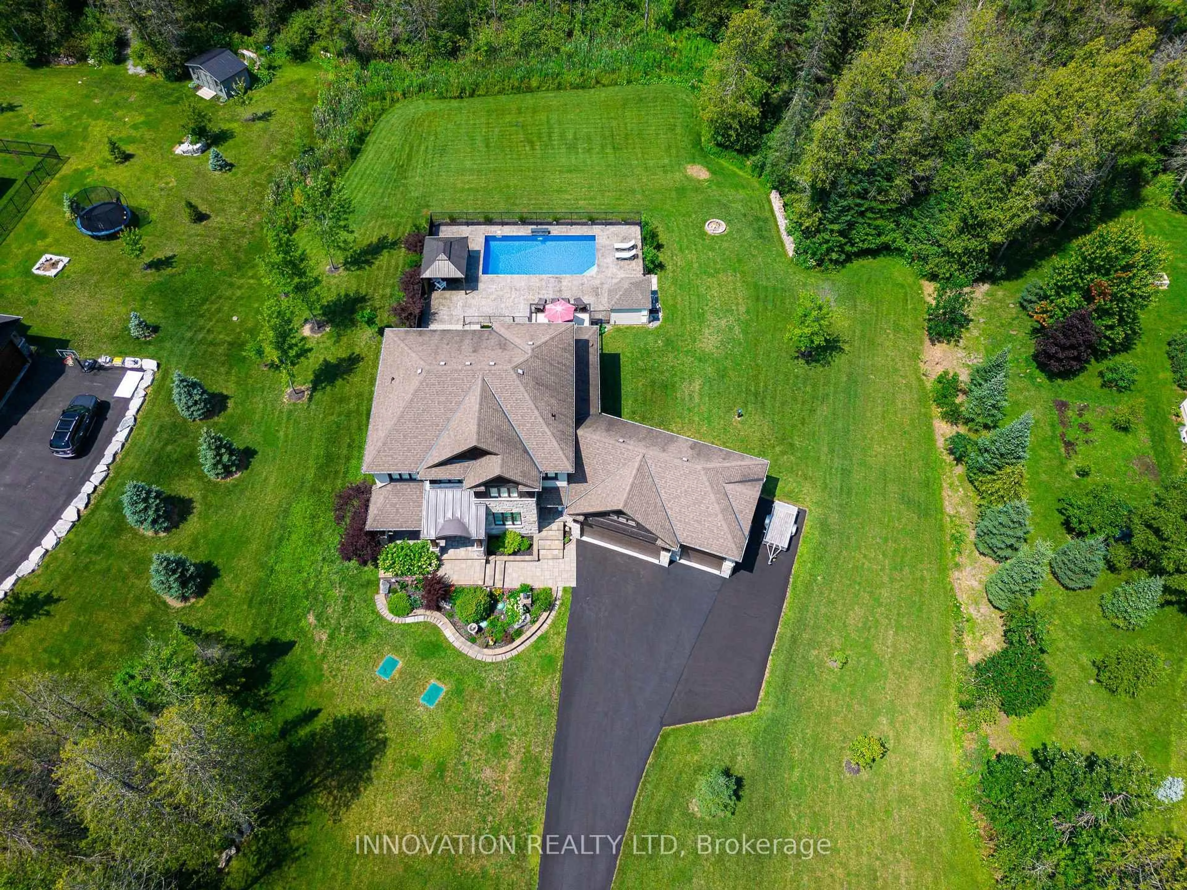 A pic from outside/outdoor area/front of a property/back of a property/a pic from drone, water/lake/river/ocean view for 323 Silent Wood Grve, Carp Ontario K0A 1L0