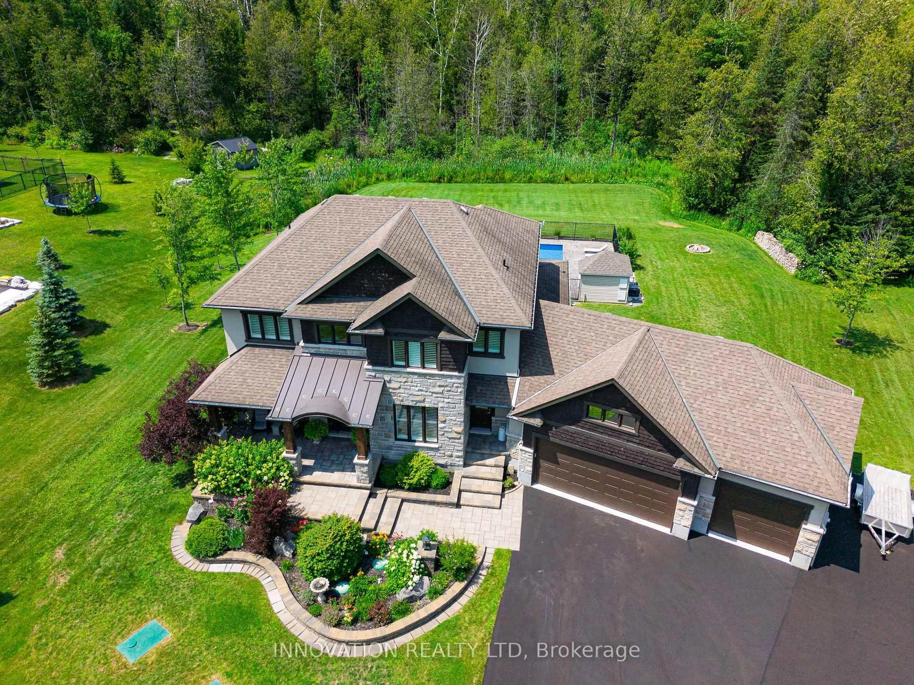 A pic from outside/outdoor area/front of a property/back of a property/a pic from drone, unknown for 323 Silent Wood Grve, Carp Ontario K0A 1L0