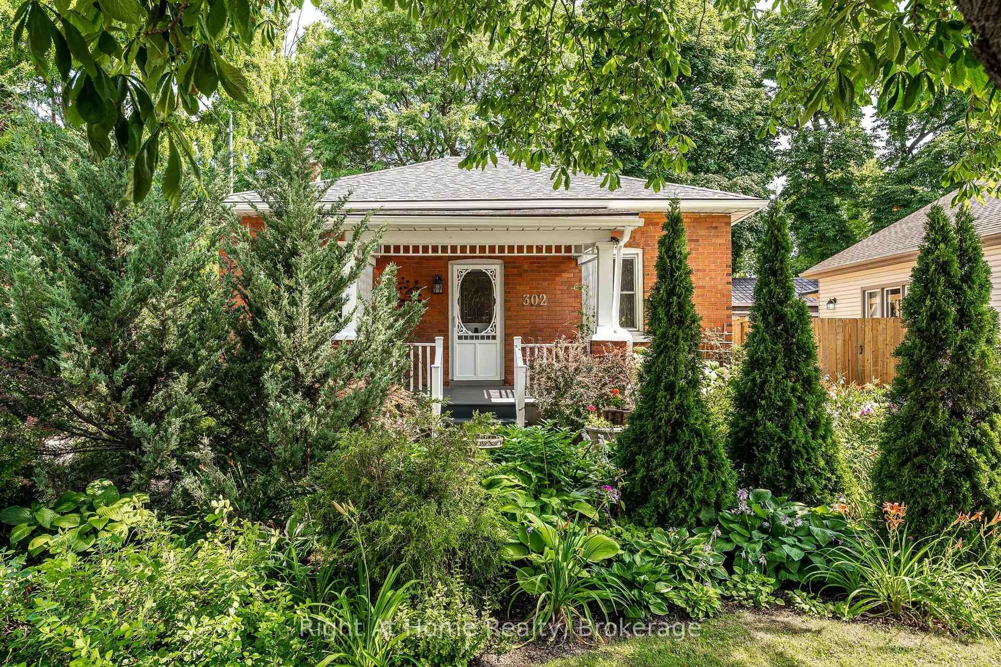 Home with brick exterior material, street for 302 Huron St, Stratford Ontario N5A 5T4