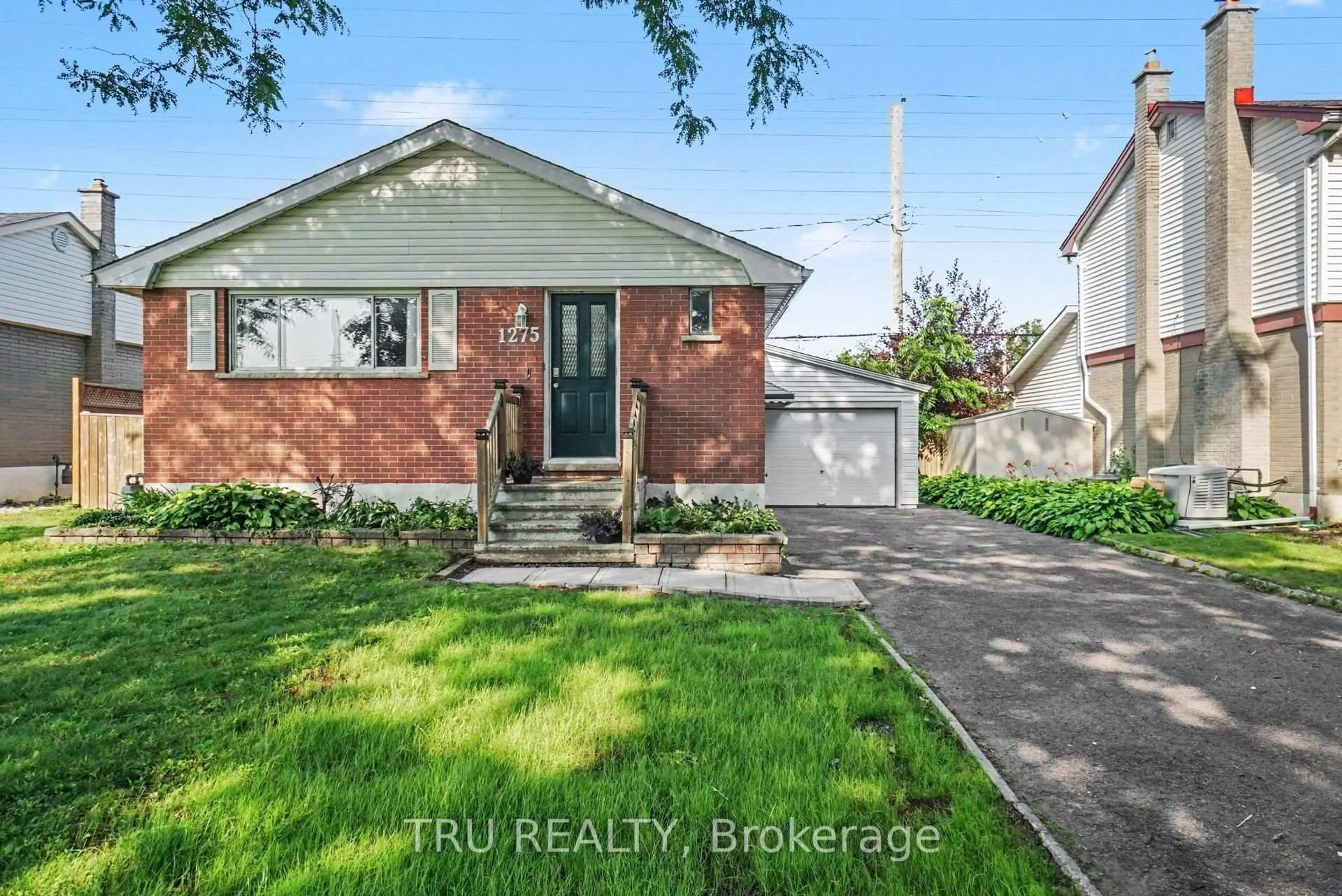 Home with brick exterior material, street for 1275 Woodside Dr, Ottawa Ontario K2C 2H1