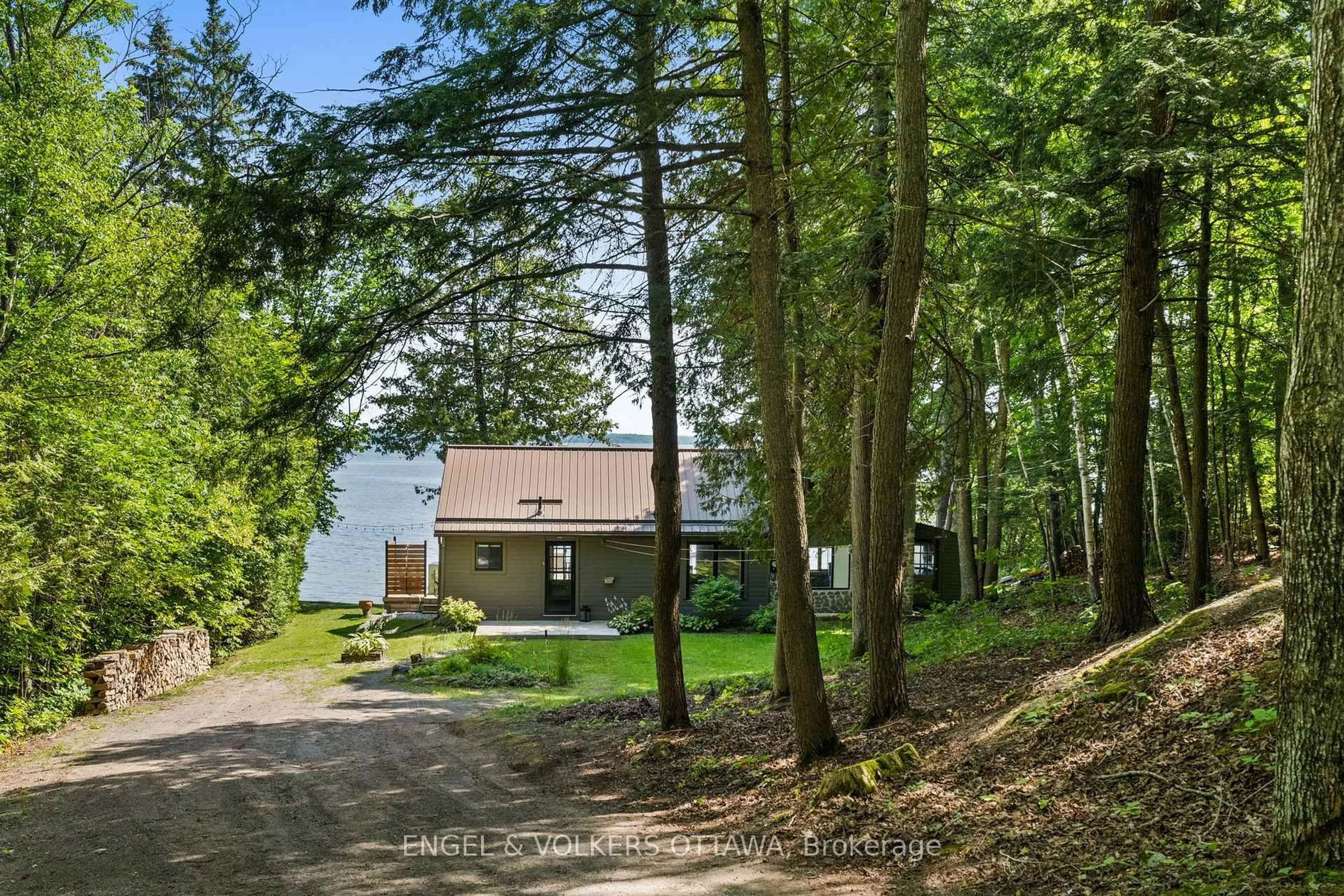 A pic from outside/outdoor area/front of a property/back of a property/a pic from drone, forest/trees view for 167 Barrett Chute Rd, Calabogie Ontario K0J 1H0