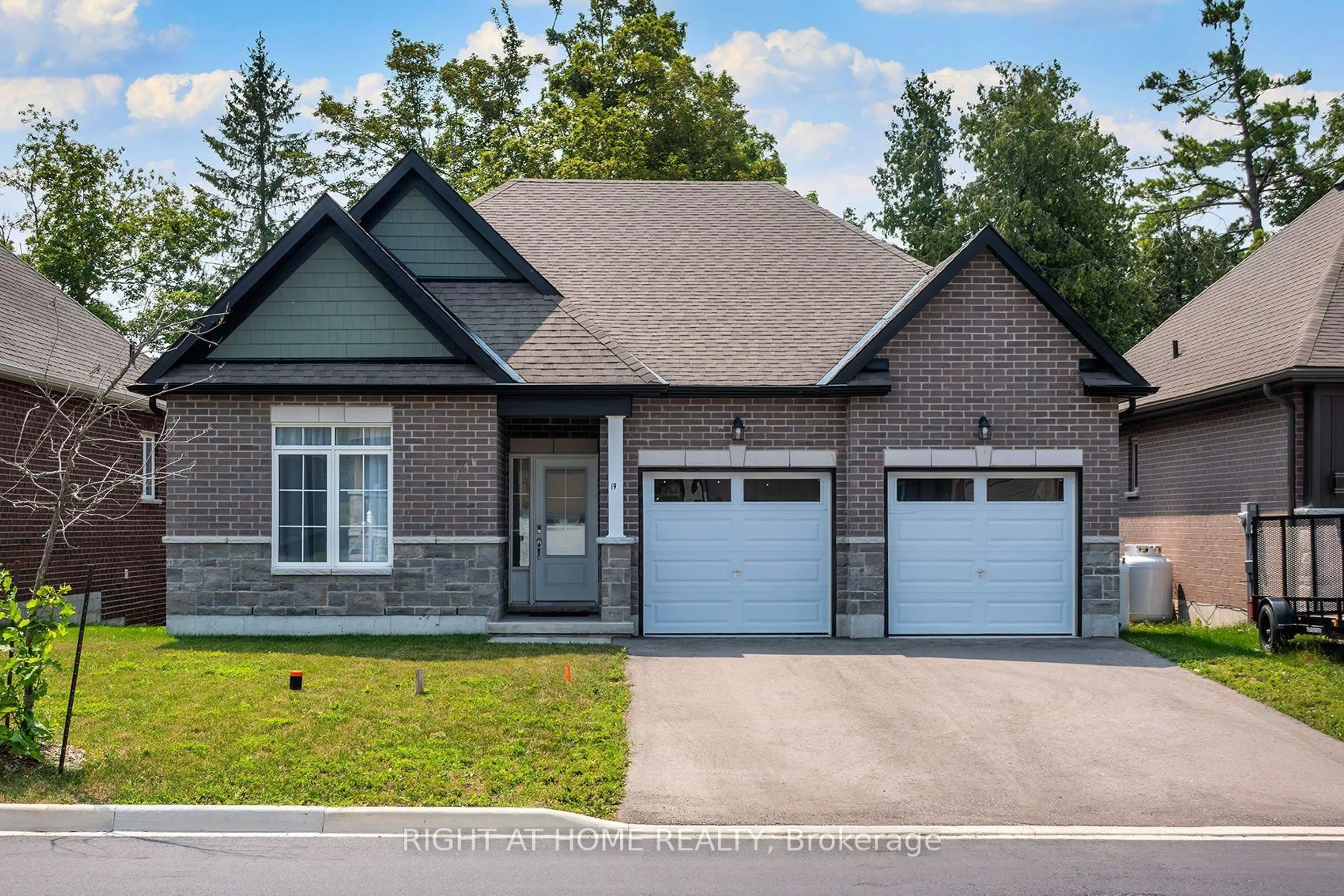Home with brick exterior material, street for 19 Hillcroft Way, Kawartha Lakes Ontario K0M 1A0