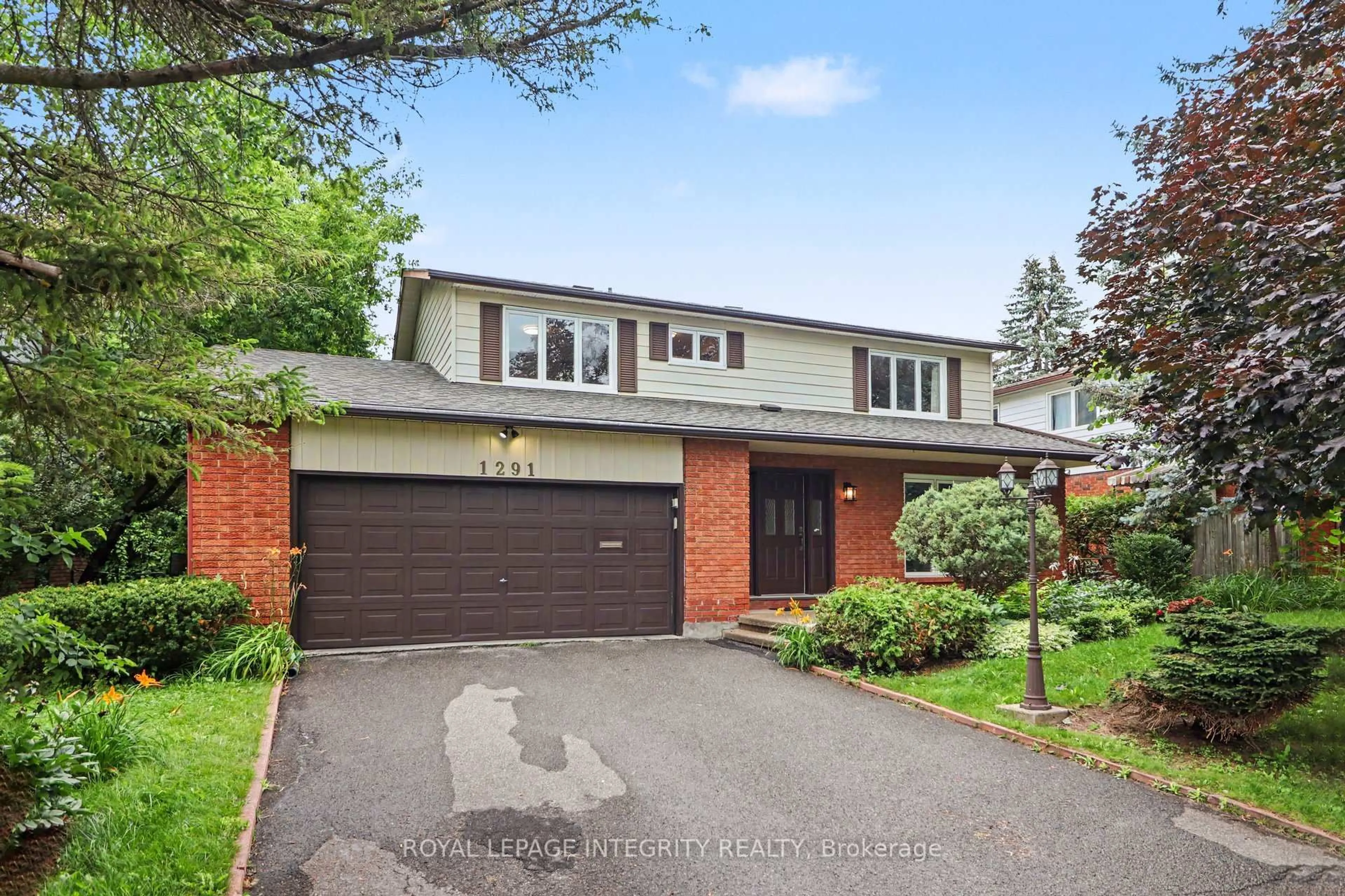 Home with brick exterior material, street for 1291 Lampman Cres, Ottawa Ontario K2C 1P9