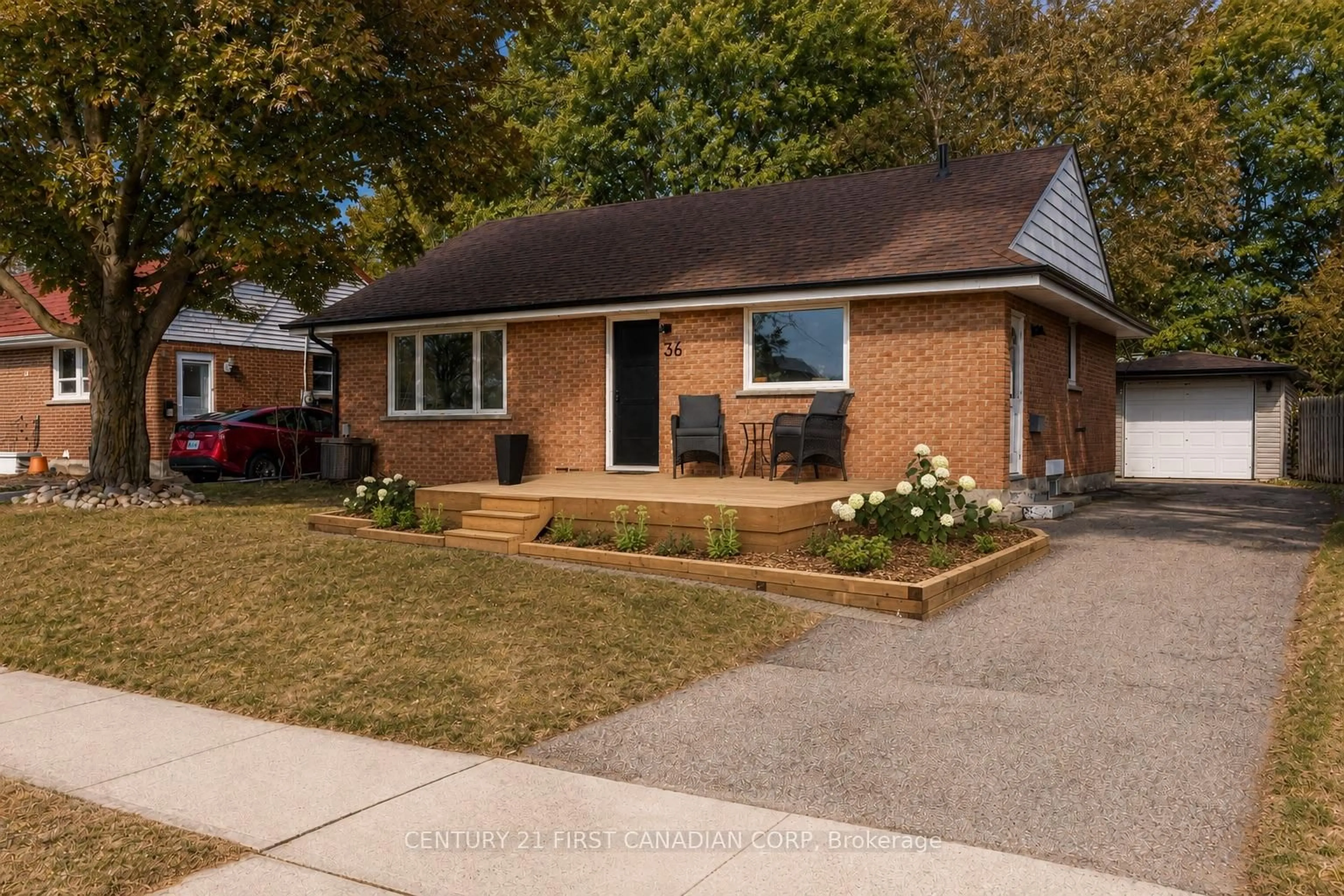 Home with brick exterior material, street for 36 Edgewood Dr, Kitchener Ontario N2M 2A1