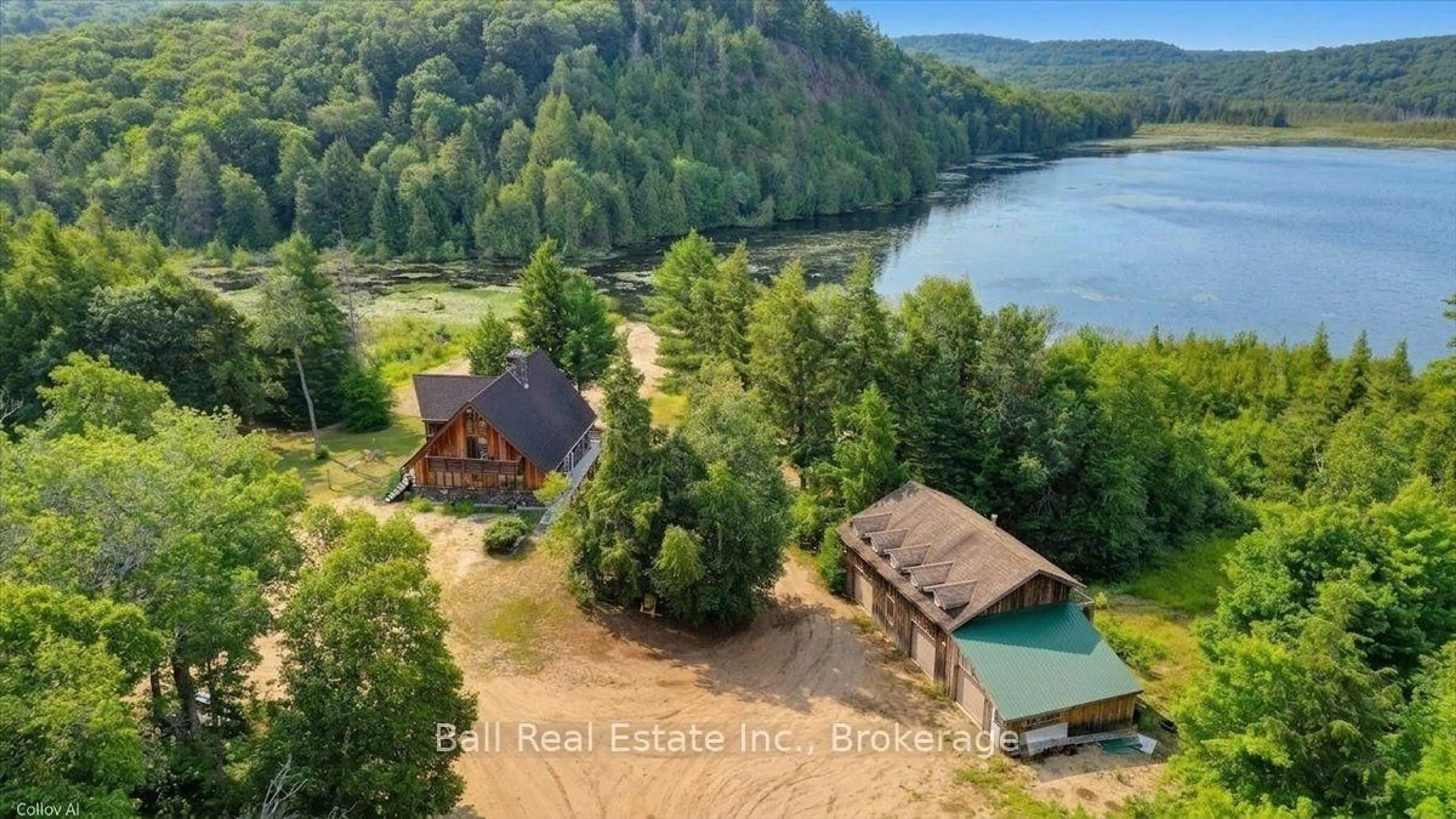 A pic from outside/outdoor area/front of a property/back of a property/a pic from drone, water/lake/river/ocean view for 1608 Tusk Tr, Dysart et al Ontario K0L 1X0