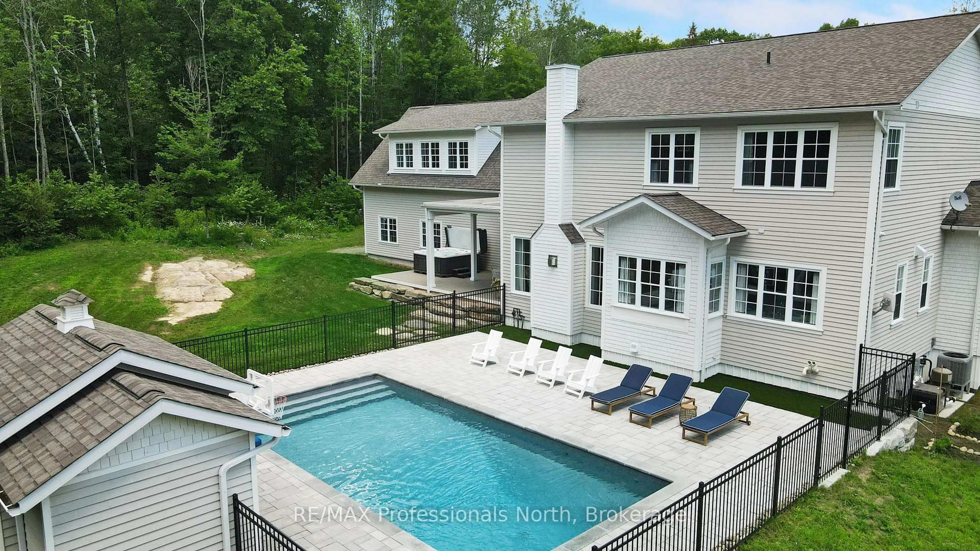 A pic from outside/outdoor area/front of a property/back of a property/a pic from drone, water/lake/river/ocean view for 1018 Flagstone Lane, Minden Hills Ontario K0M 2K0