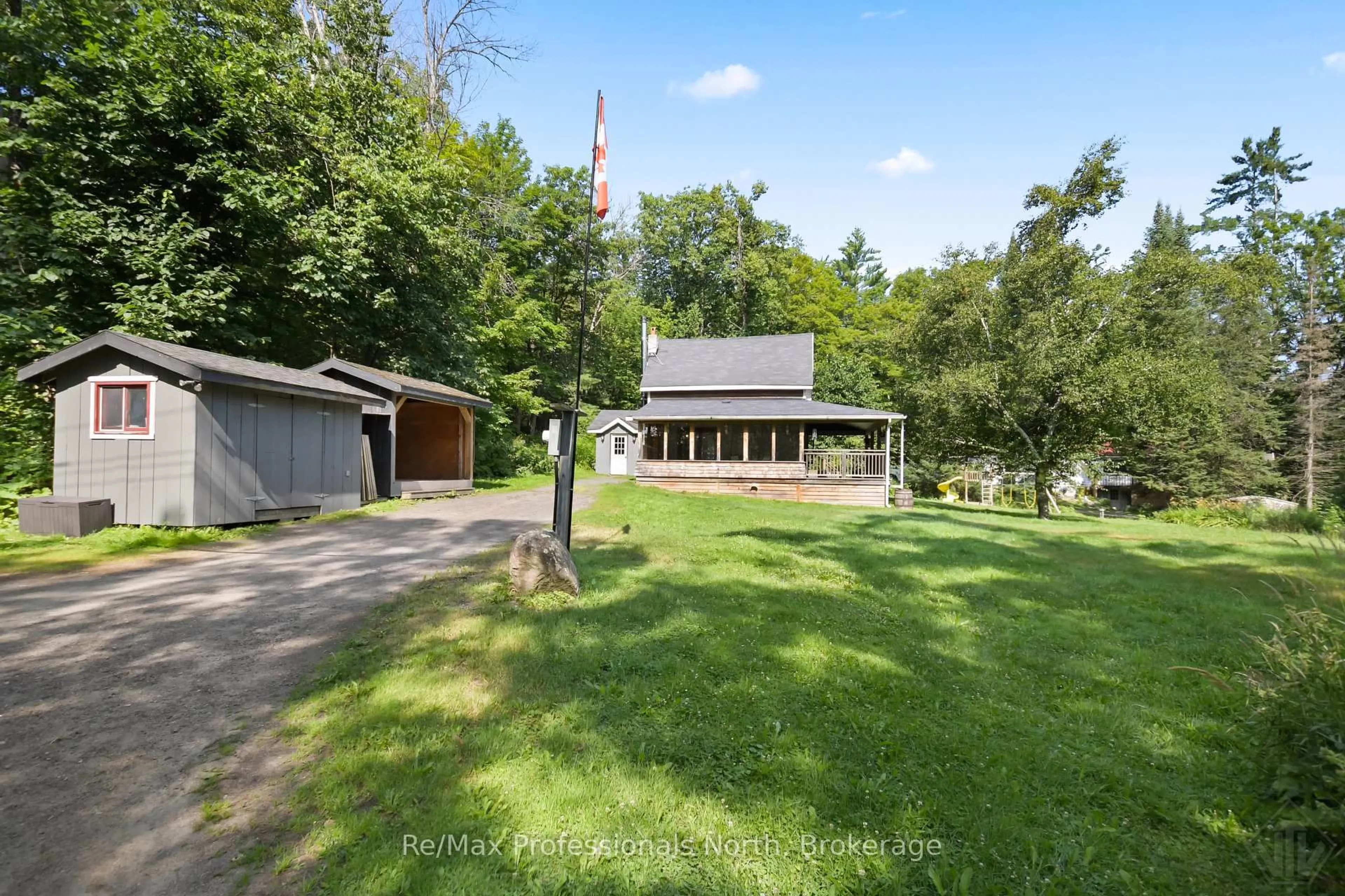 A pic from outside/outdoor area/front of a property/back of a property/a pic from drone, unknown for 1658 Housey's Rapids Rd, Gravenhurst Ontario P1P 1R3