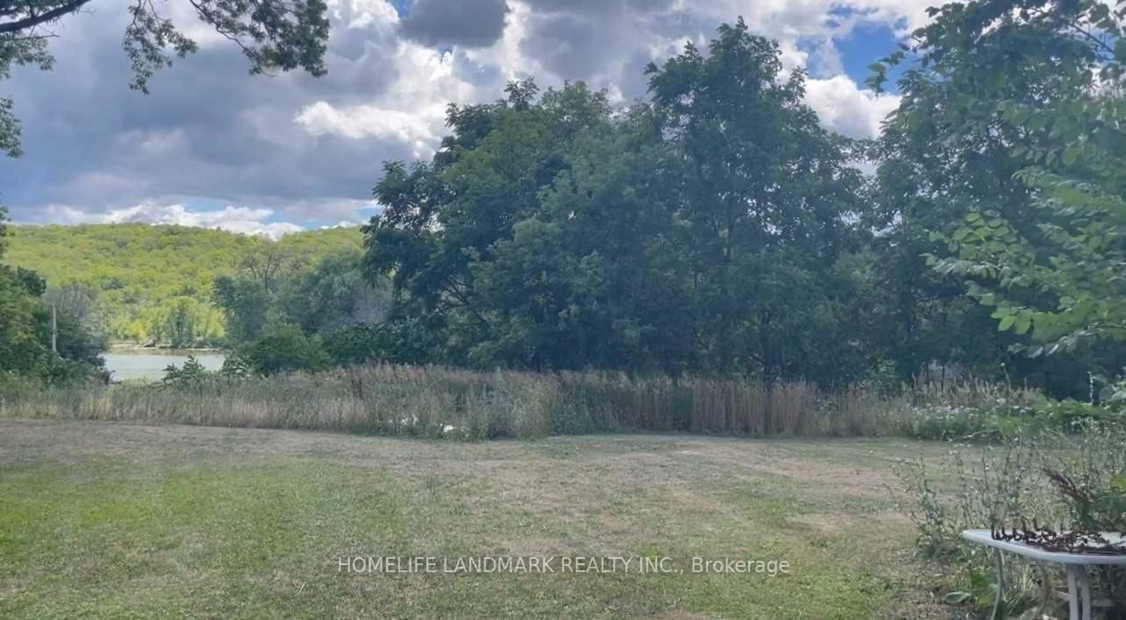 A pic from outside/outdoor area/front of a property/back of a property/a pic from drone, forest/trees view for 1355 County Rd 45, Asphodel-Norwood Ontario K0L 2V0
