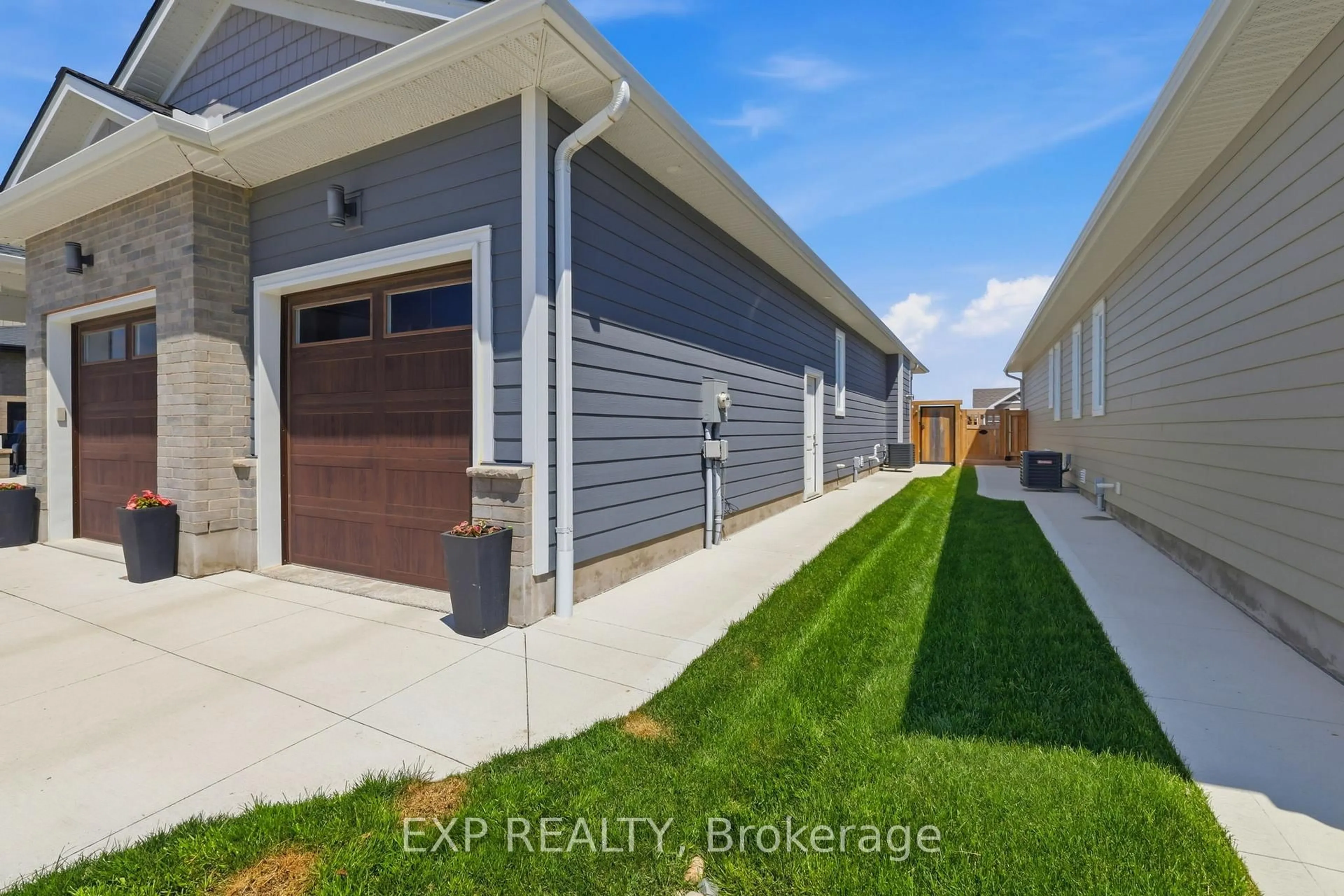 A pic from outside/outdoor area/front of a property/back of a property/a pic from drone, street for 56 Optimist Dr, Southwold Ontario N5P 0G4
