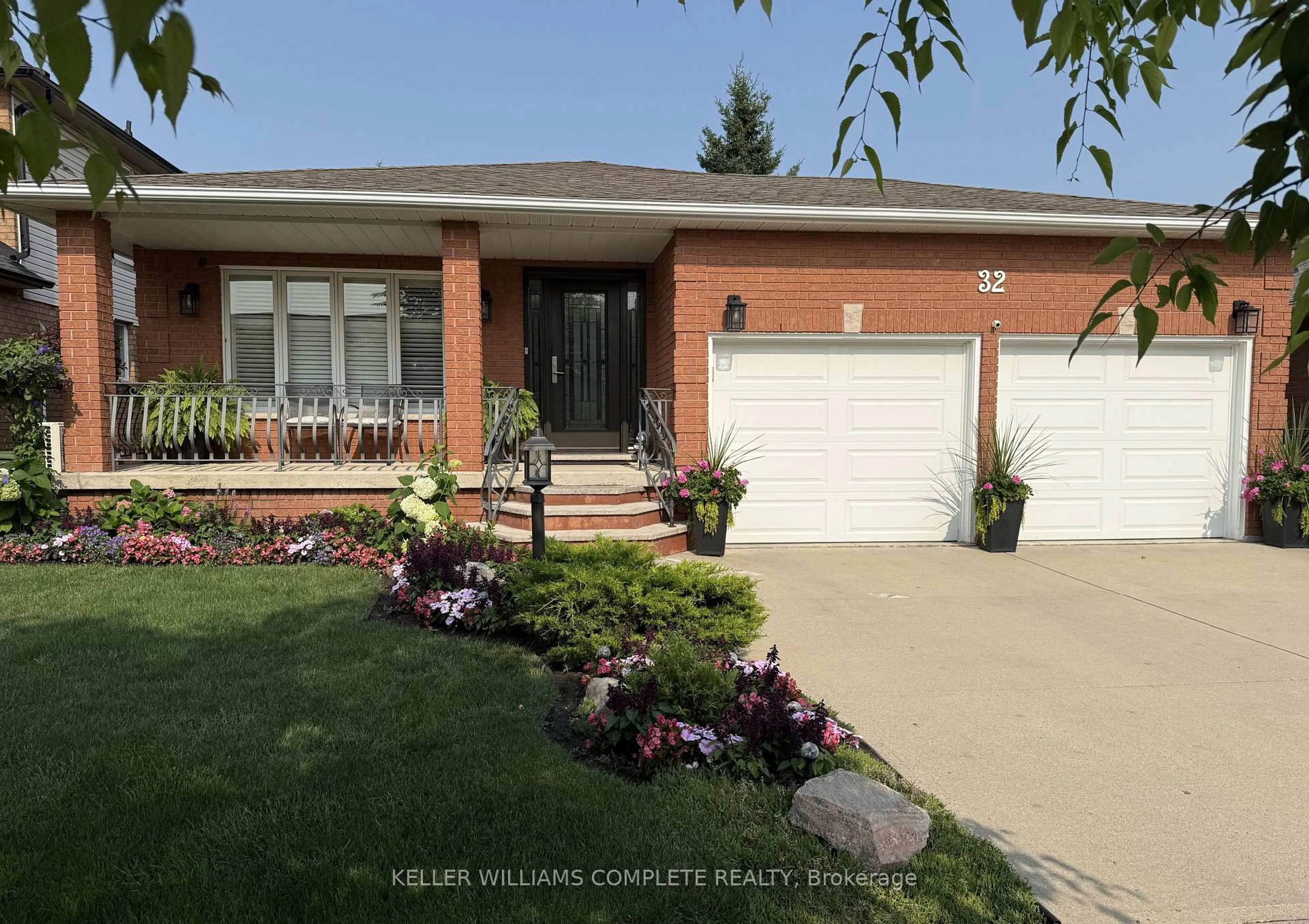 Home with brick exterior material, street for 32 Highbury Dr, Hamilton Ontario L8J 2T4