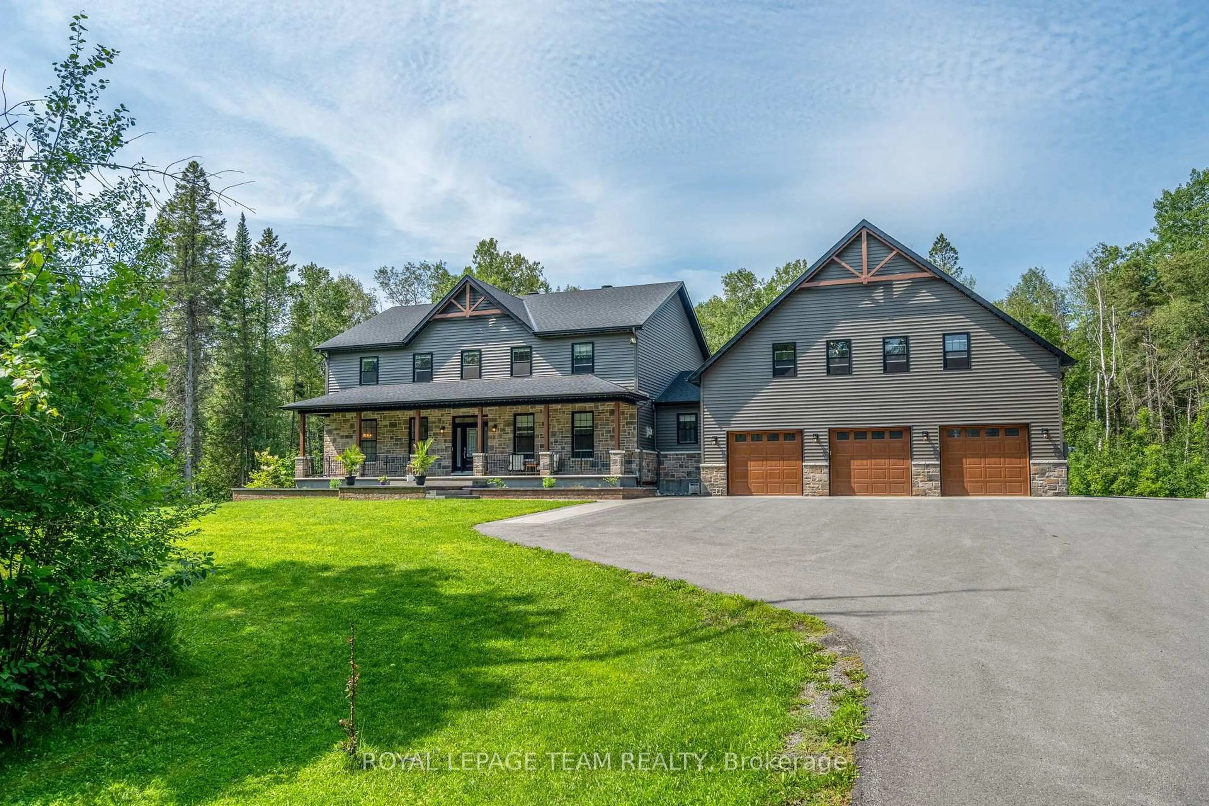 A pic from outside/outdoor area/front of a property/back of a property/a pic from drone, mountain view for 74 Smith Rd, North Grenville Ontario K0G 1T0