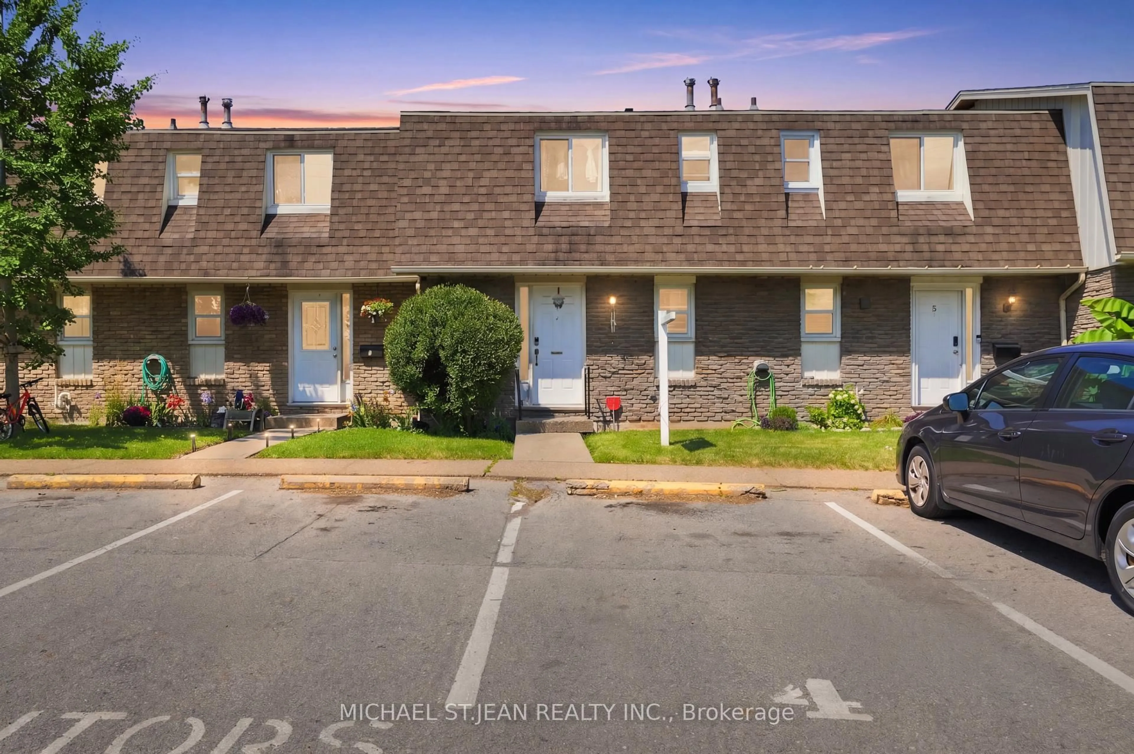 A pic from outside/outdoor area/front of a property/back of a property/a pic from drone, street for 131 Rockwood Ave #4, St. Catharines Ontario L2P 3K4