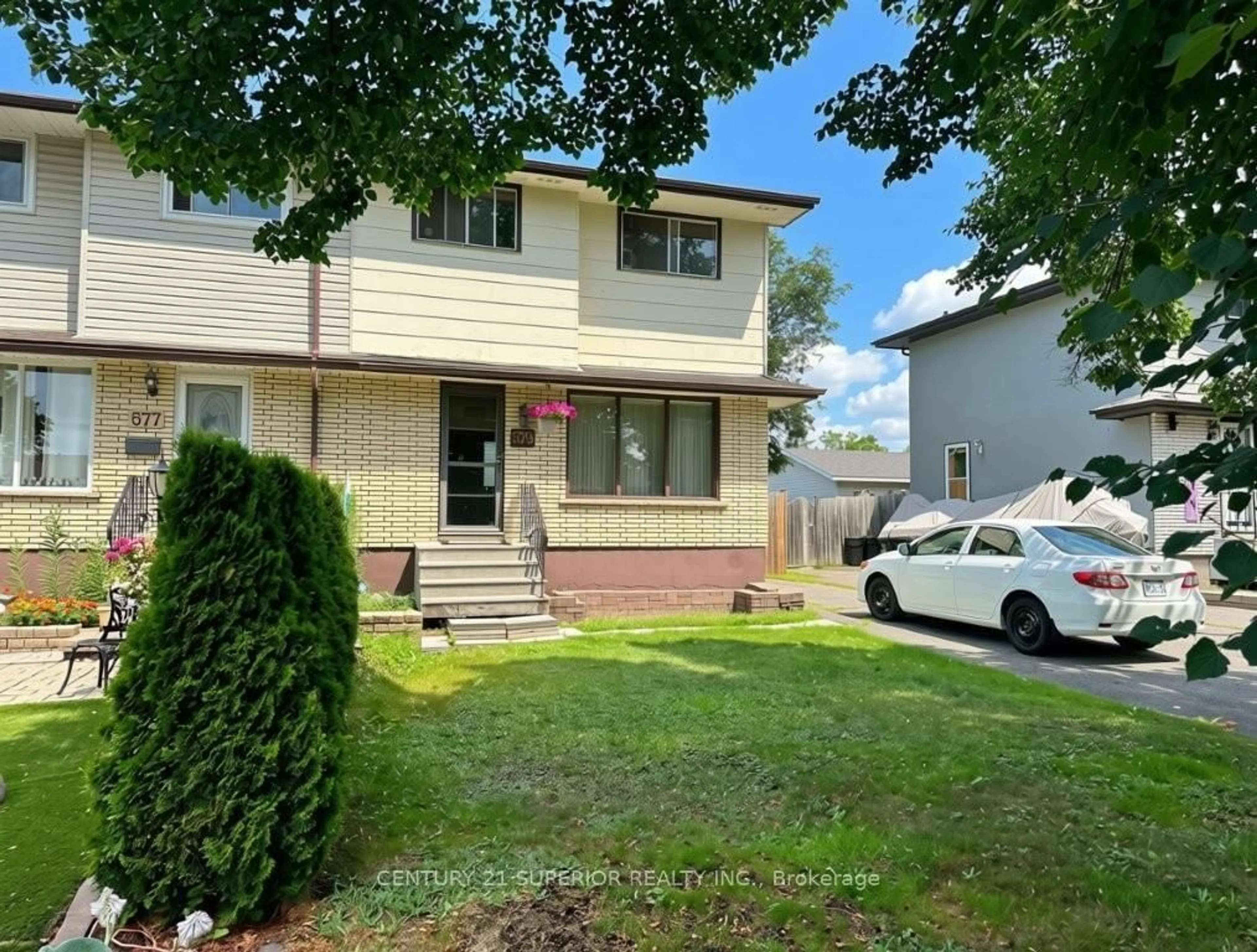 Home with vinyl exterior material, street for 579 Simon Fraser Drive, Thunder Bay Ontario P7C 5B3