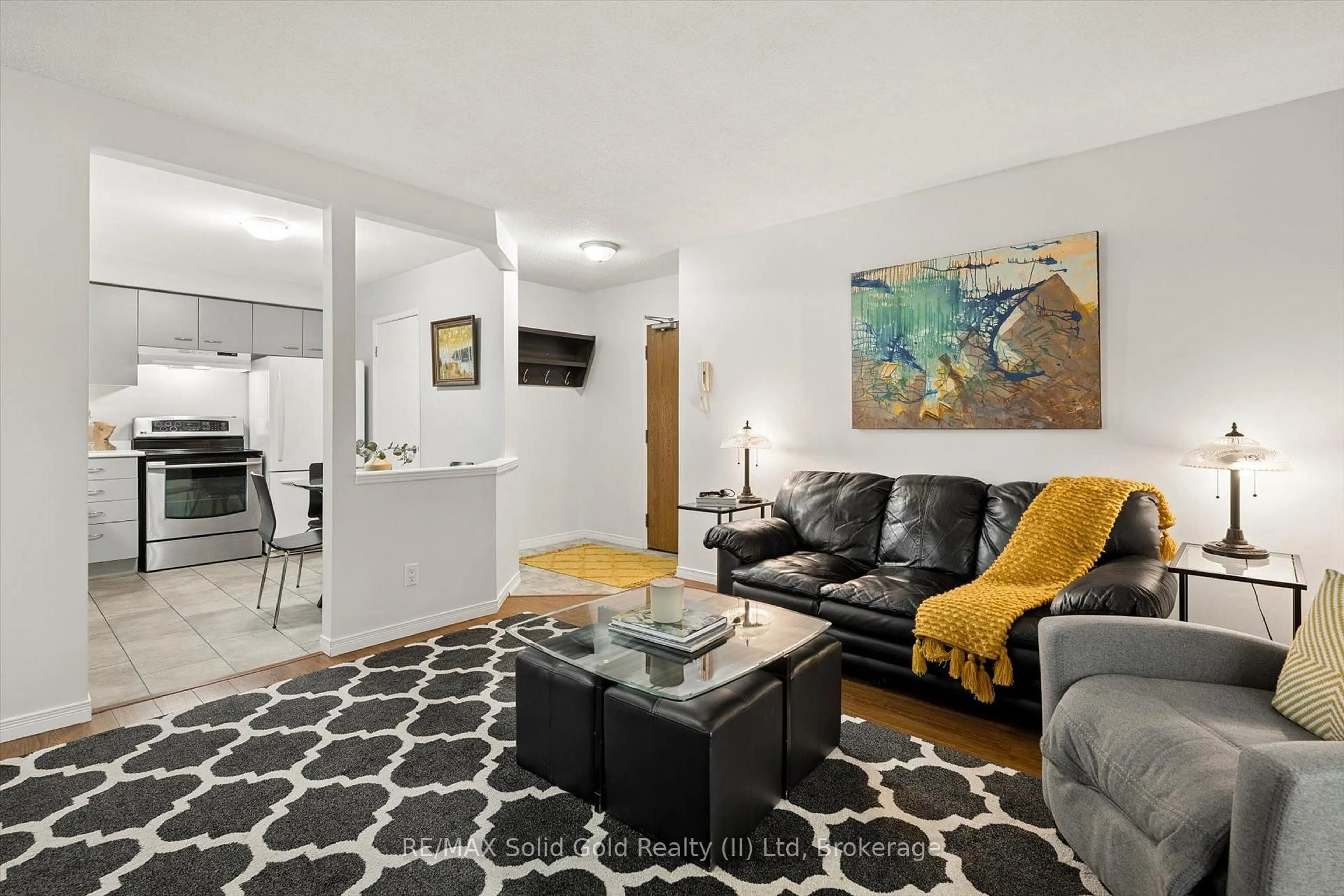 Living room with furniture, unknown for 565 Greenfield Ave #912, Kitchener Ontario N2C 2P5