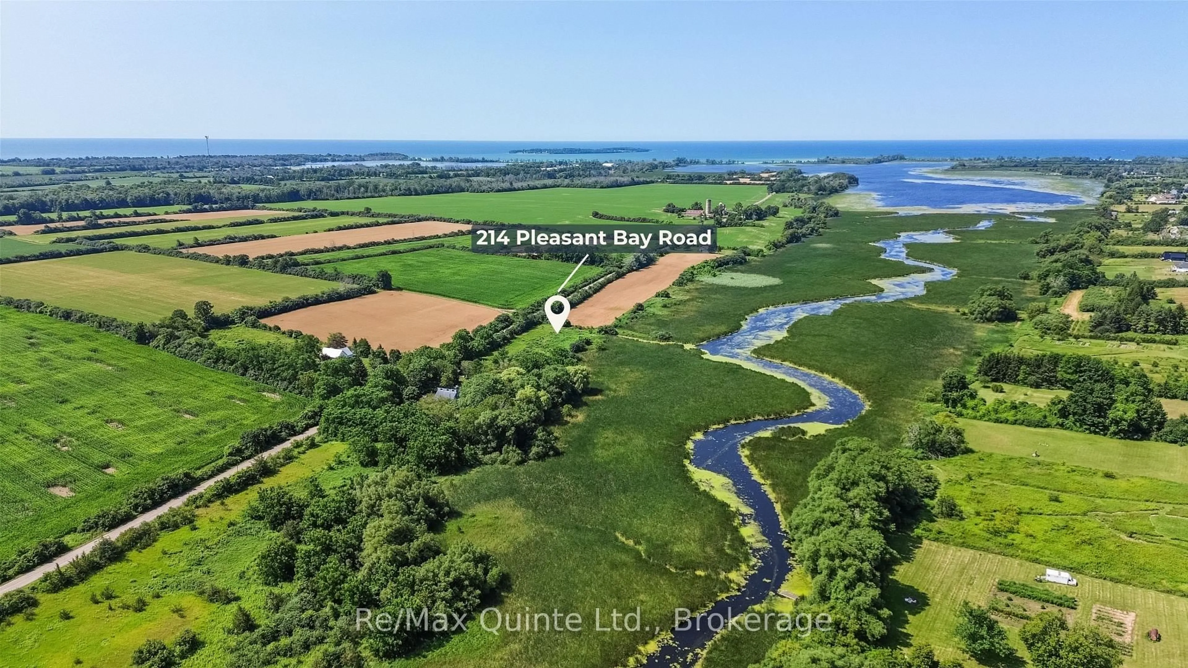 A pic from outside/outdoor area/front of a property/back of a property/a pic from drone, water/lake/river/ocean view for 214 Pleasant Bay Rd, Prince Edward County Ontario K0K 2J0