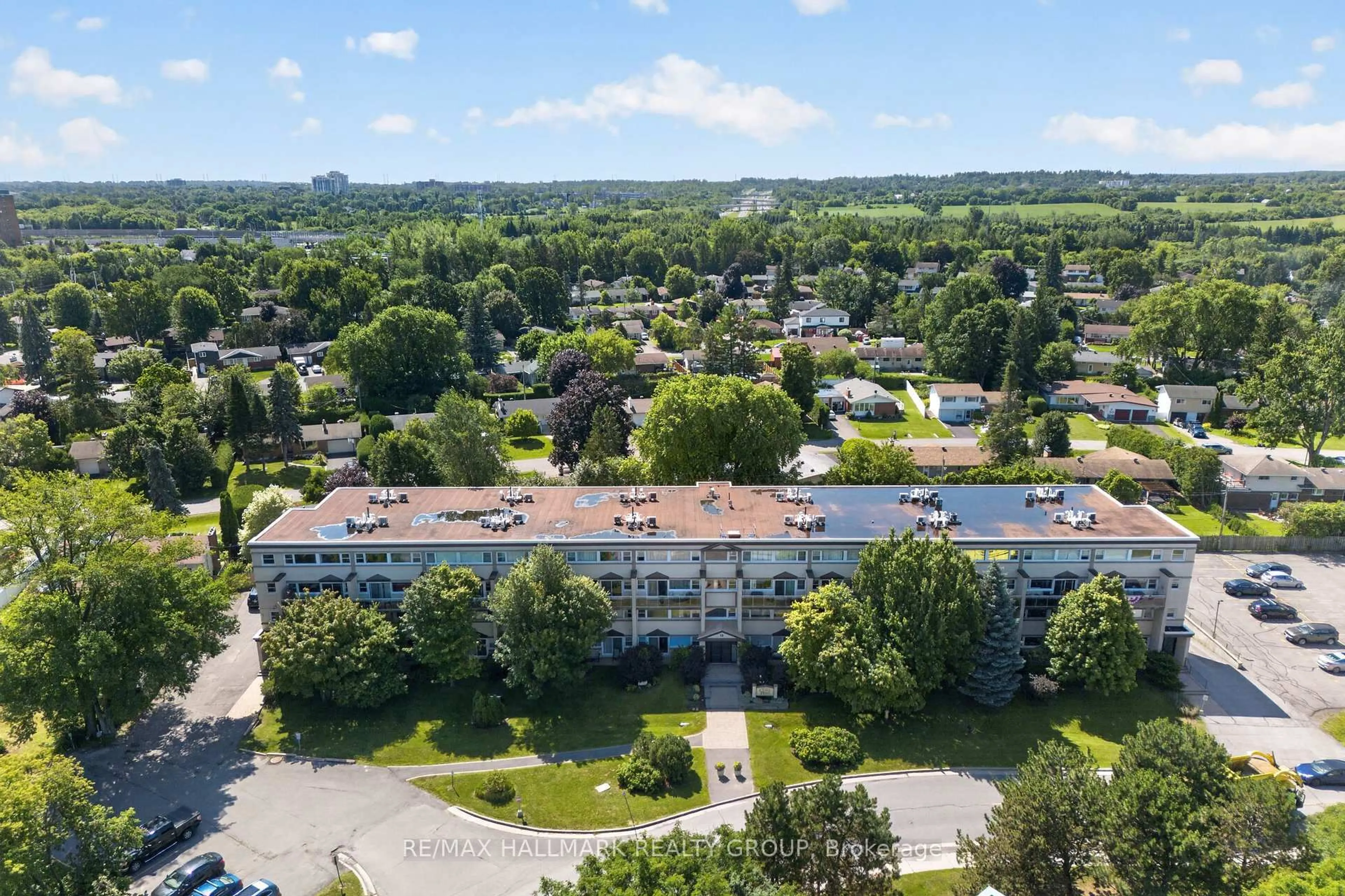A pic from outside/outdoor area/front of a property/back of a property/a pic from drone, unknown for 12 Corkstown Rd #103, Ottawa Ontario K2H 5B3