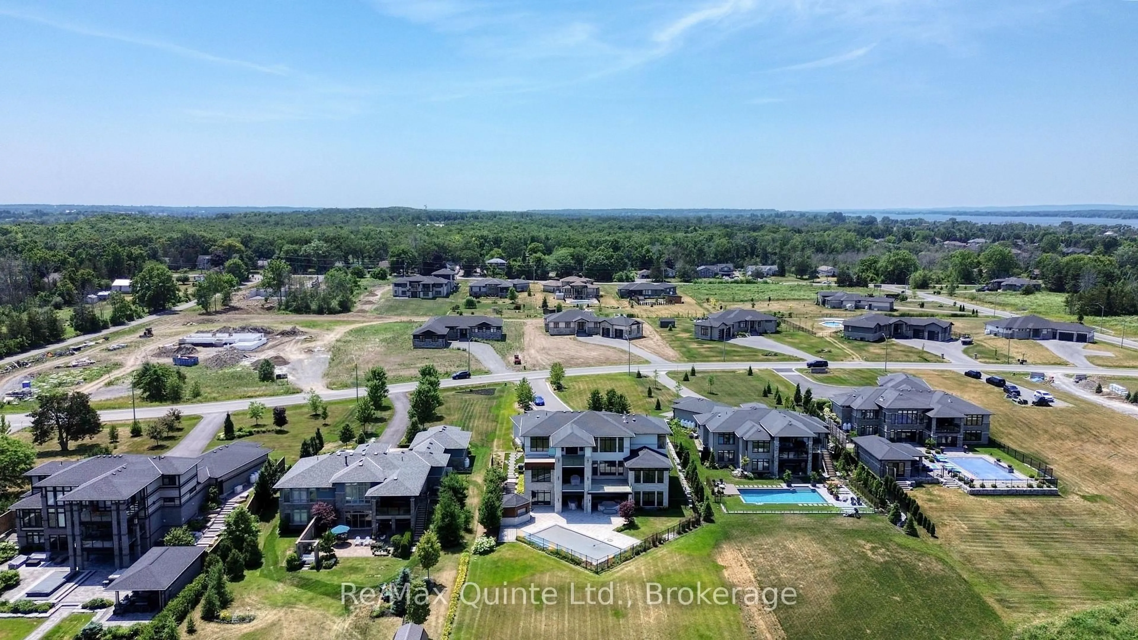 A pic from outside/outdoor area/front of a property/back of a property/a pic from drone, water/lake/river/ocean view for 25 Leaside Dr, Prince Edward County Ontario K8N 4Z7