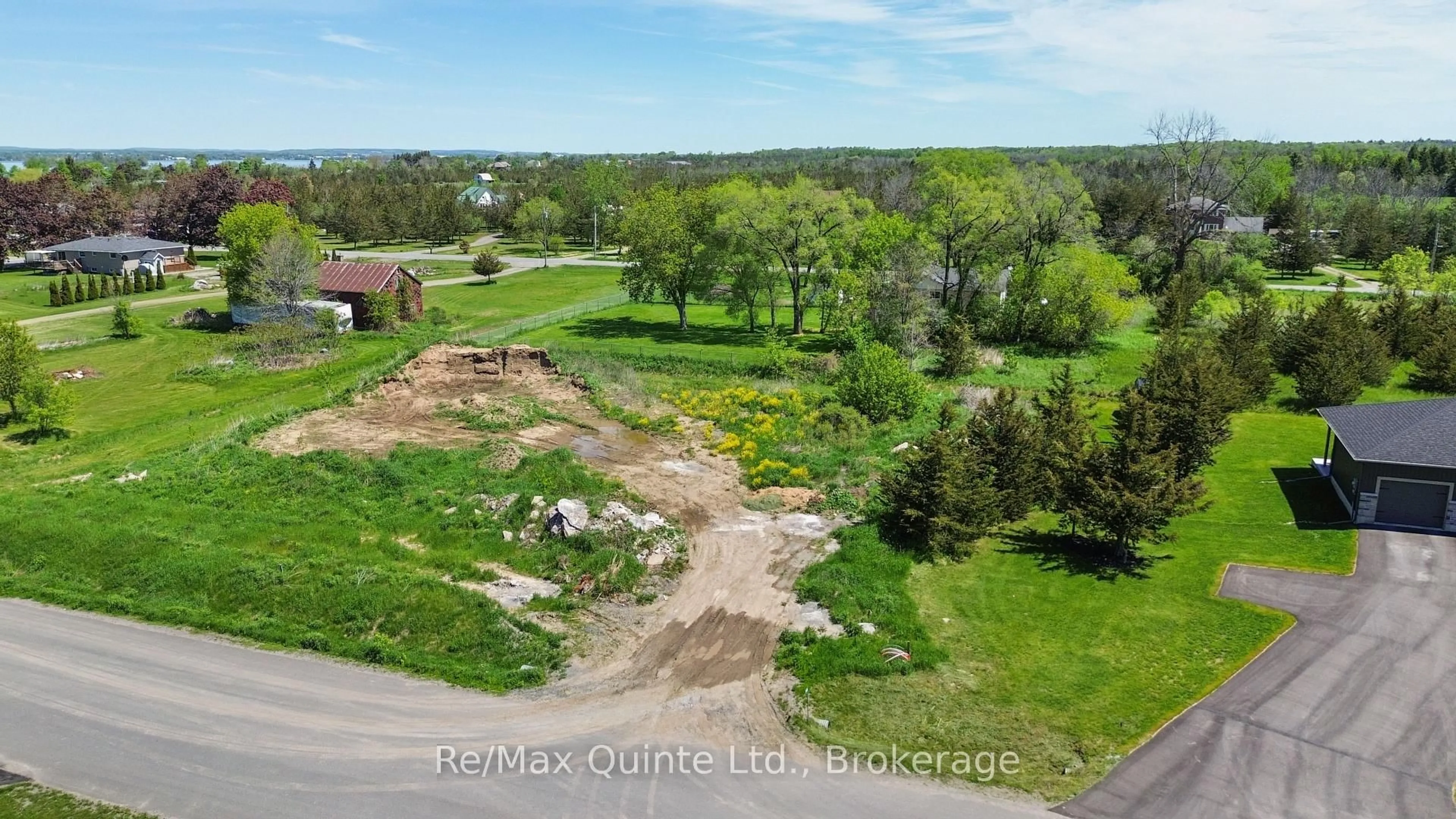 A pic from outside/outdoor area/front of a property/back of a property/a pic from drone, water/lake/river/ocean view for 348 Michael's Way, Prince Edward County Ontario K0K 1L0