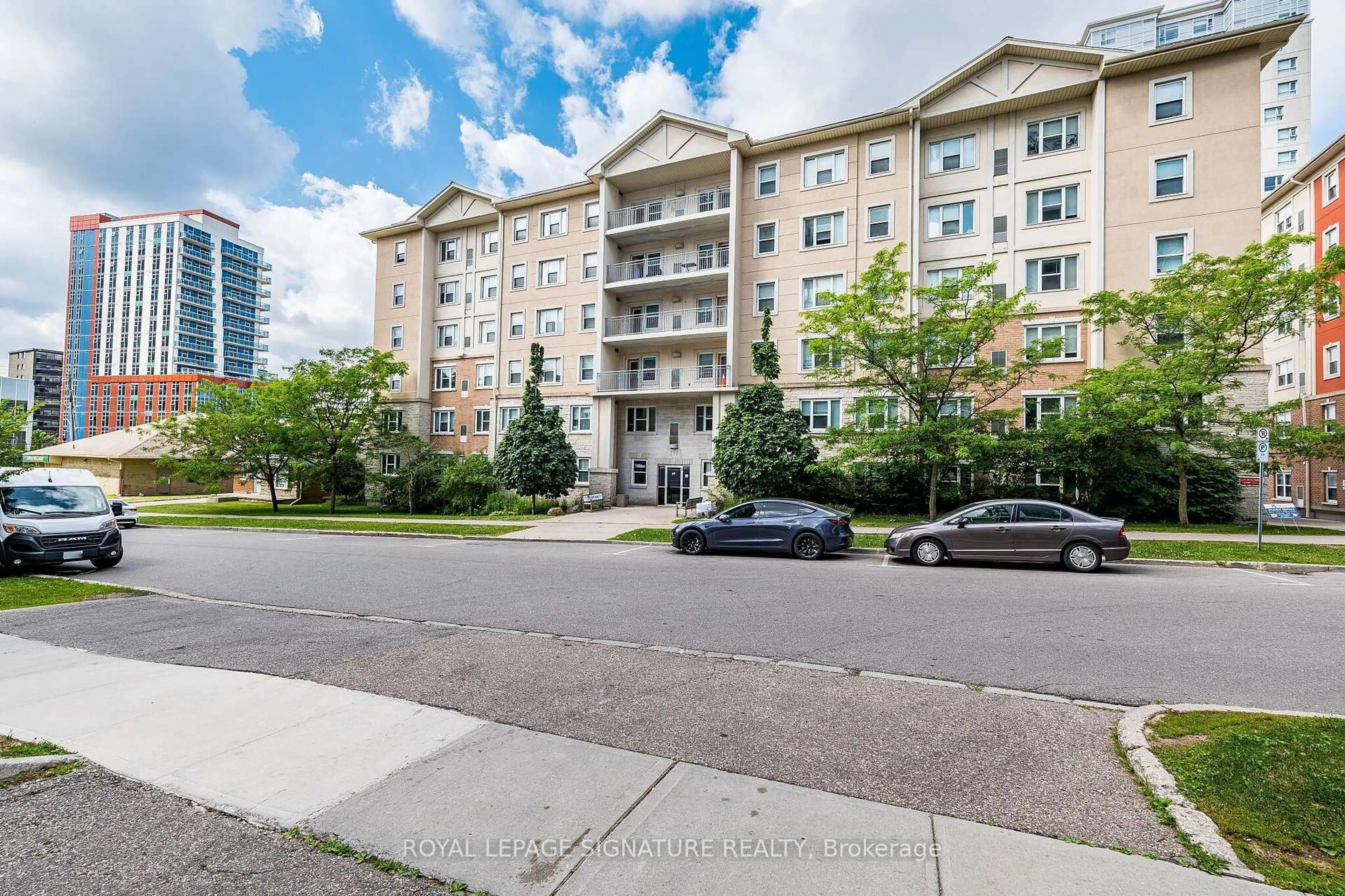 A pic from outside/outdoor area/front of a property/back of a property/a pic from drone, street for 251 Lester St #101, Waterloo Ontario N2L 3W6