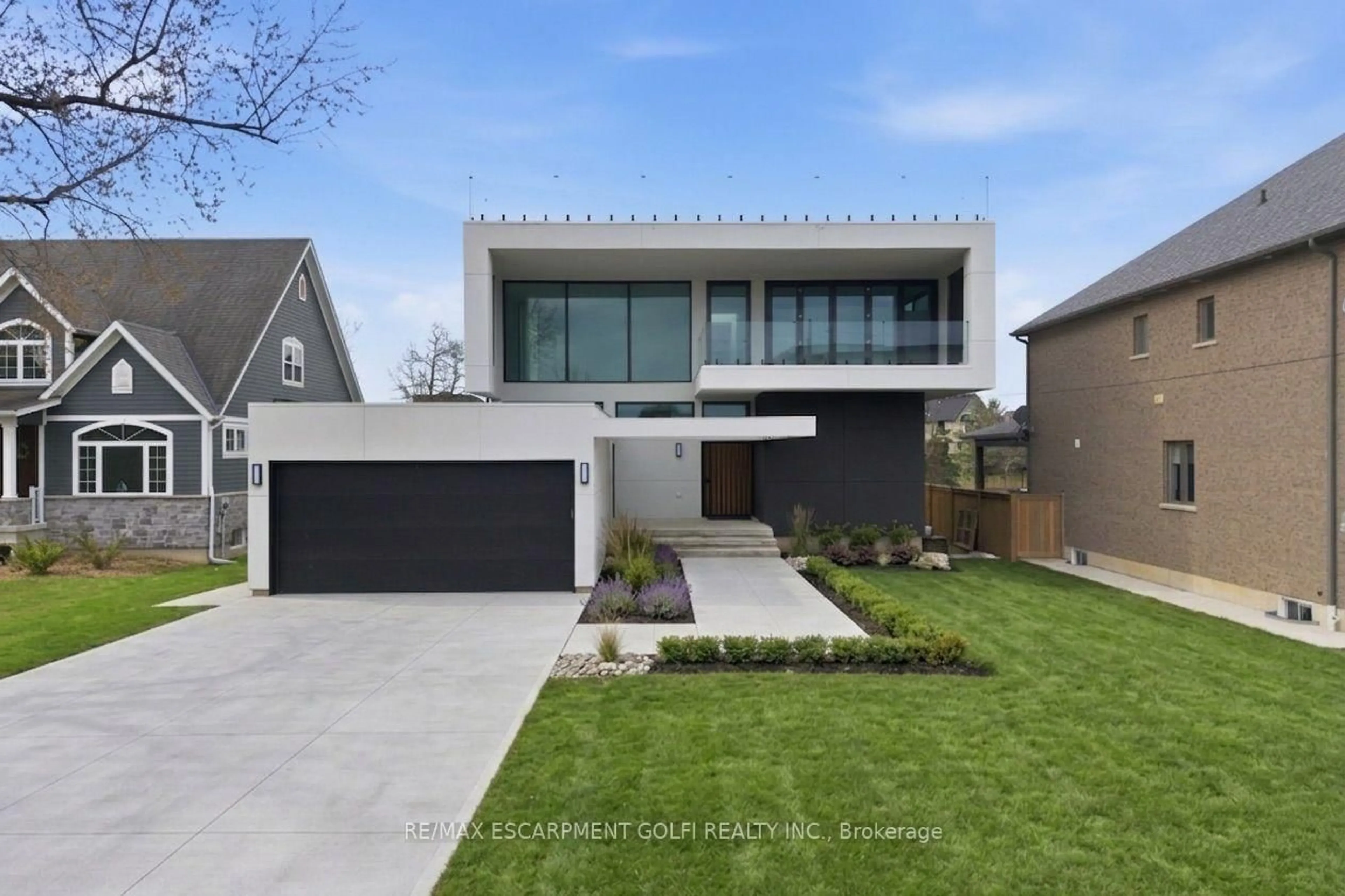 Home with brick exterior material, street for 36 Windemere Rd, Hamilton Ontario L8E 5G5
