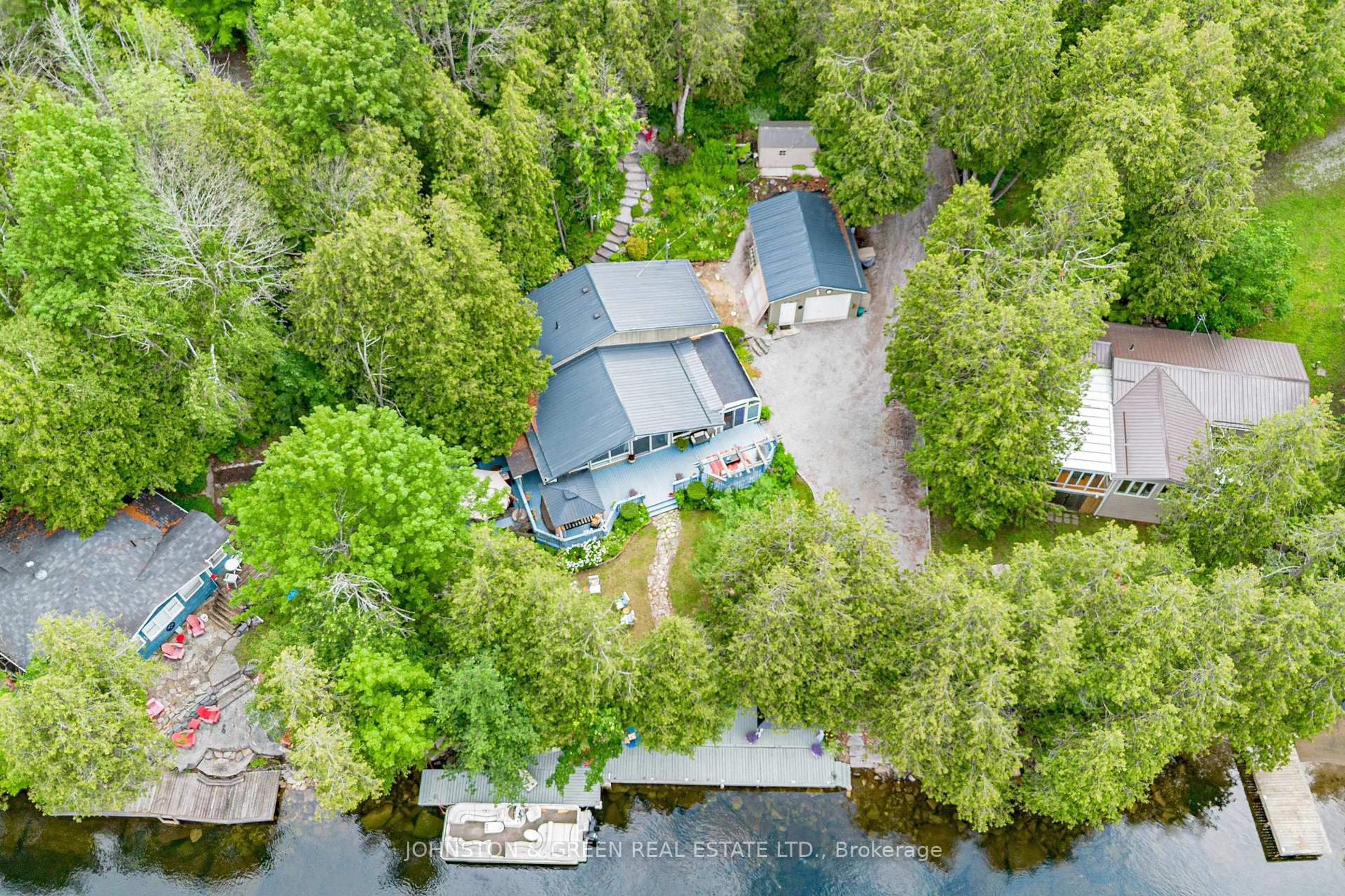 A pic from outside/outdoor area/front of a property/back of a property/a pic from drone, water/lake/river/ocean view for 110 Shadow Lake Rd 28 Rd, Kawartha Lakes Ontario K0M 1K0