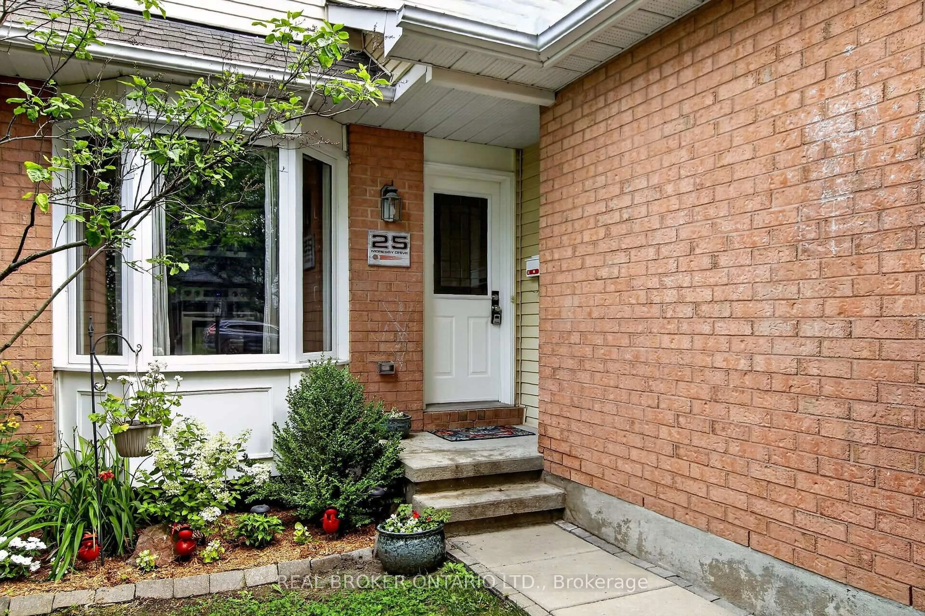 Home with brick exterior material, street for 25 Moresby Dr, Ottawa Ontario K2M 2E5