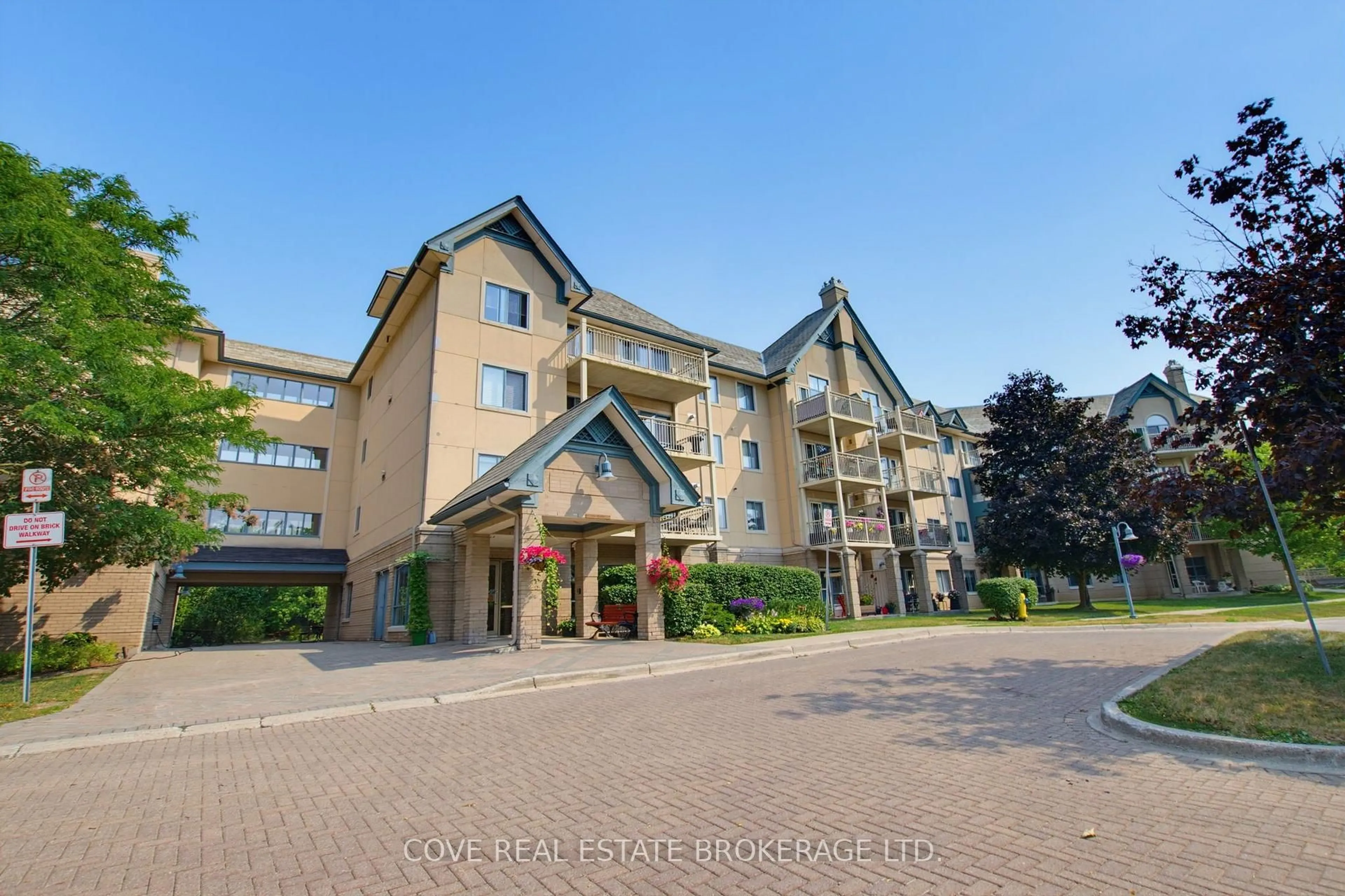 A pic from outside/outdoor area/front of a property/back of a property/a pic from drone, unknown for 511 Gainsborough Rd #203, London North Ontario N6G 4Z5