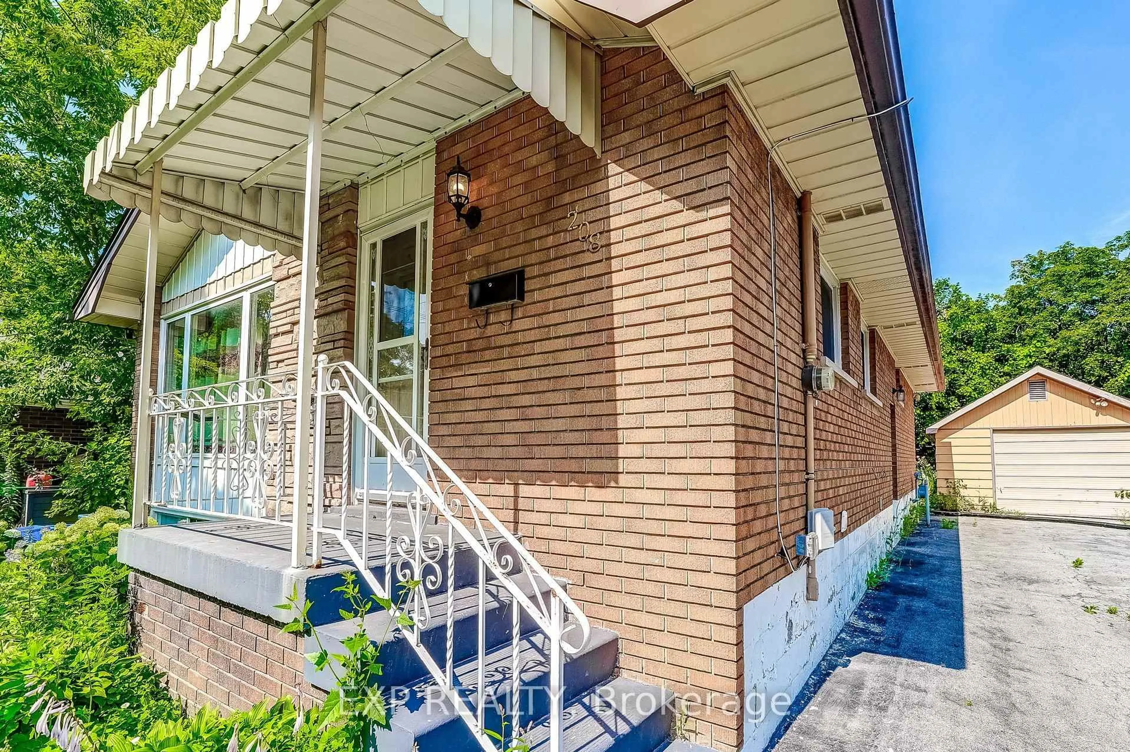 Home with brick exterior material, street for 208 West 19th St, Hamilton Ontario L9C 4J2