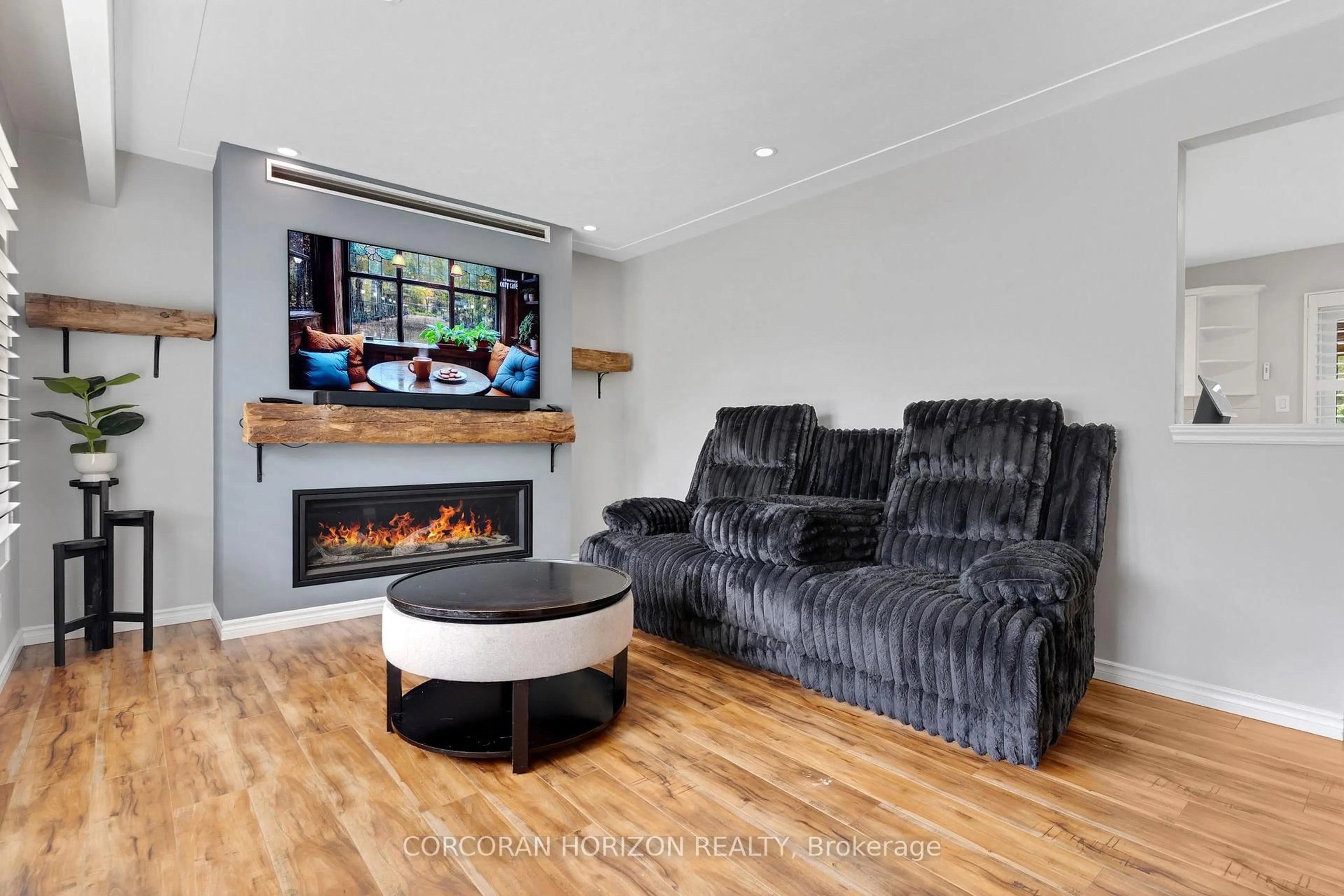 Living room with furniture, wood/laminate floor for 744 Birchwood Ave, Cambridge Ontario N3H 2V5