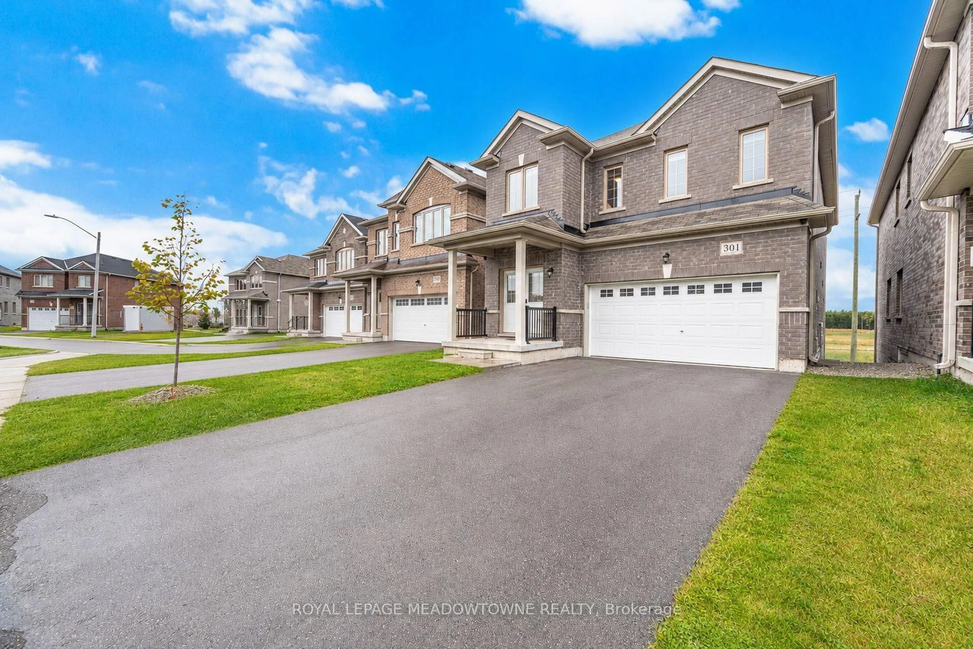 A pic from outside/outdoor area/front of a property/back of a property/a pic from drone, street for 301 Ridley Cres, Southgate Ontario N0C 1B0