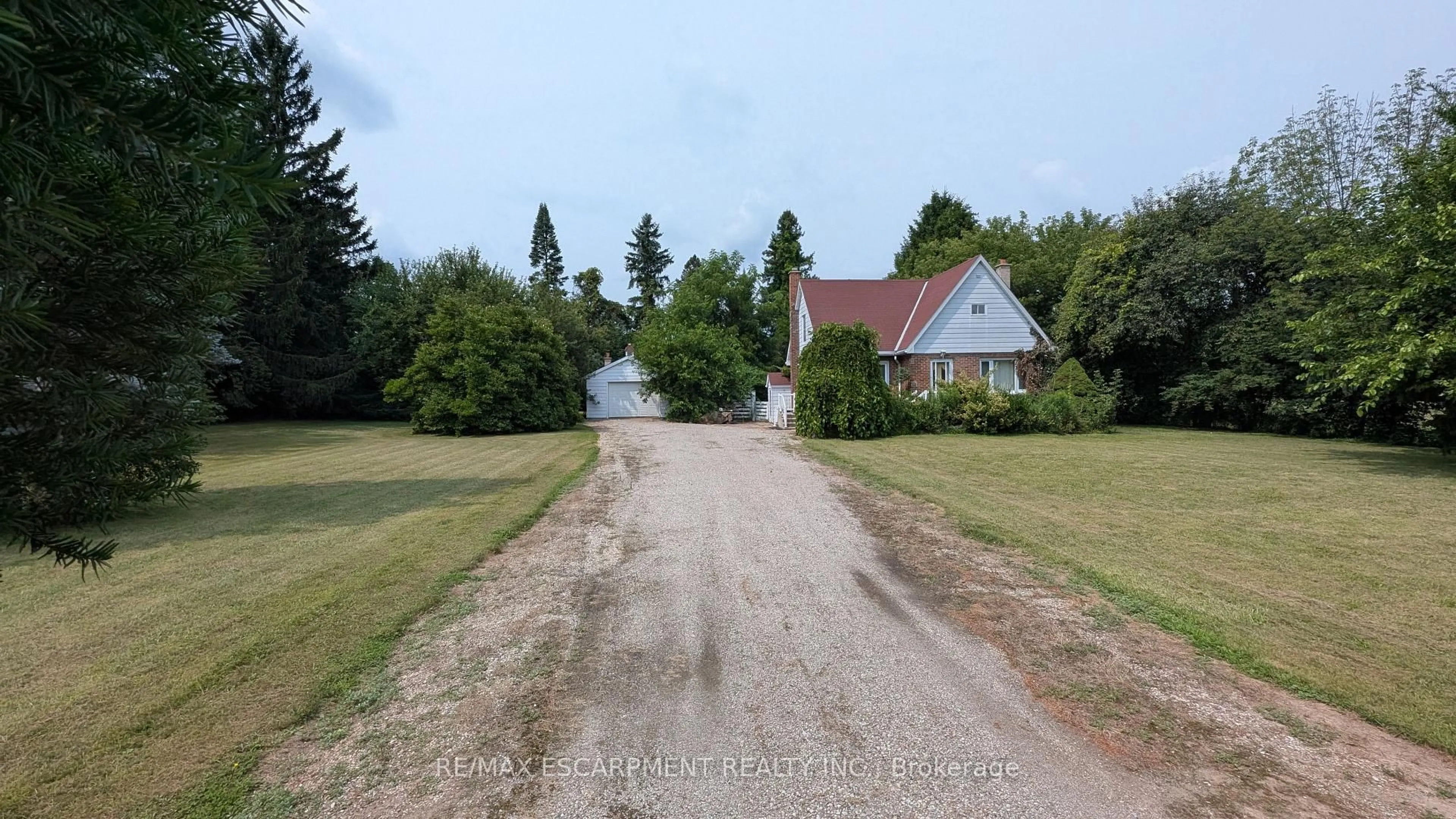 A pic from outside/outdoor area/front of a property/back of a property/a pic from drone, street for 127 Brant Rd, Brant Ontario N3L 3E1