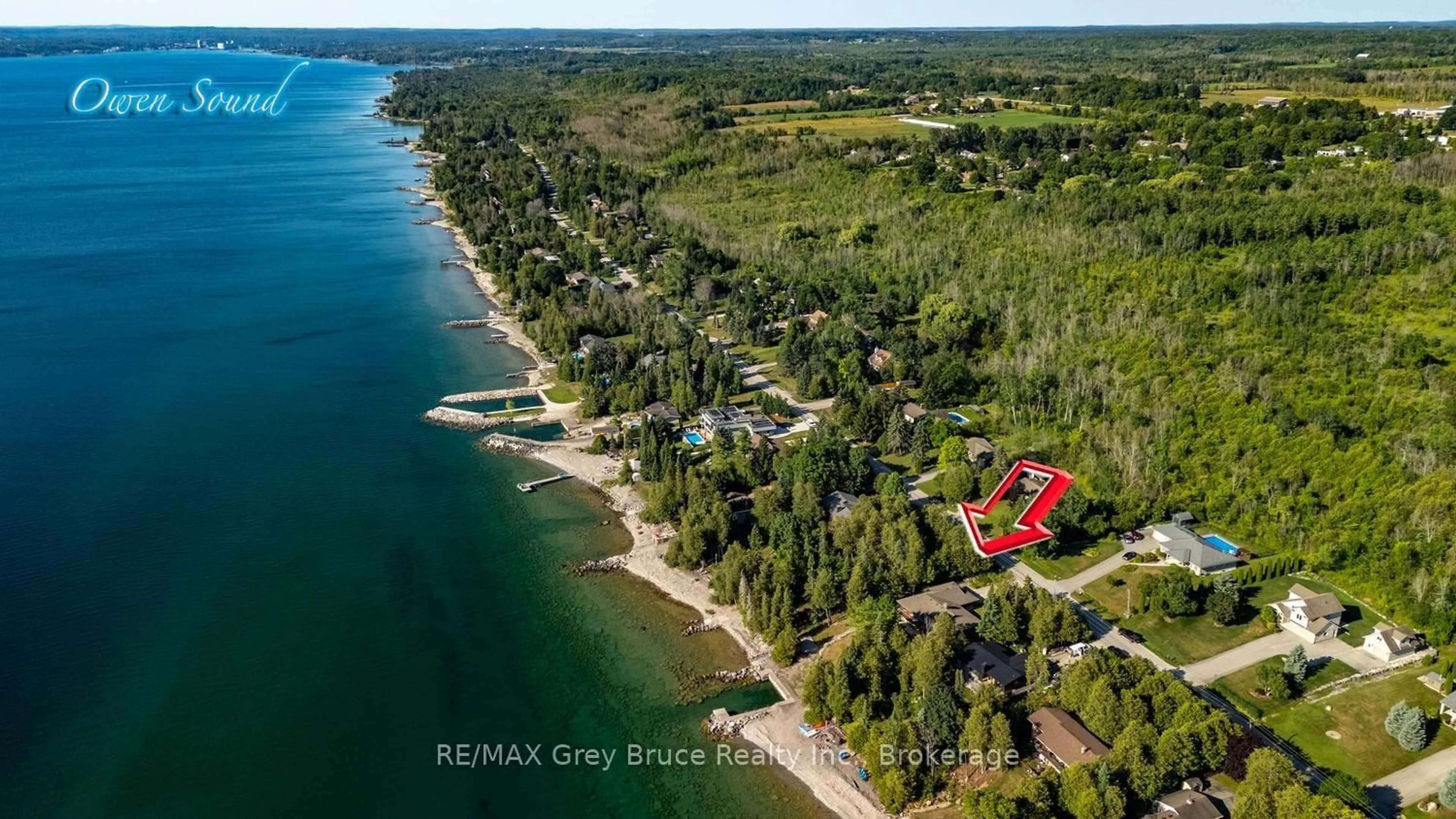 A pic from outside/outdoor area/front of a property/back of a property/a pic from drone, water/lake/river/ocean view for 491 Balmy Beach Rd, Georgian Bluffs Ontario N4K 5N4