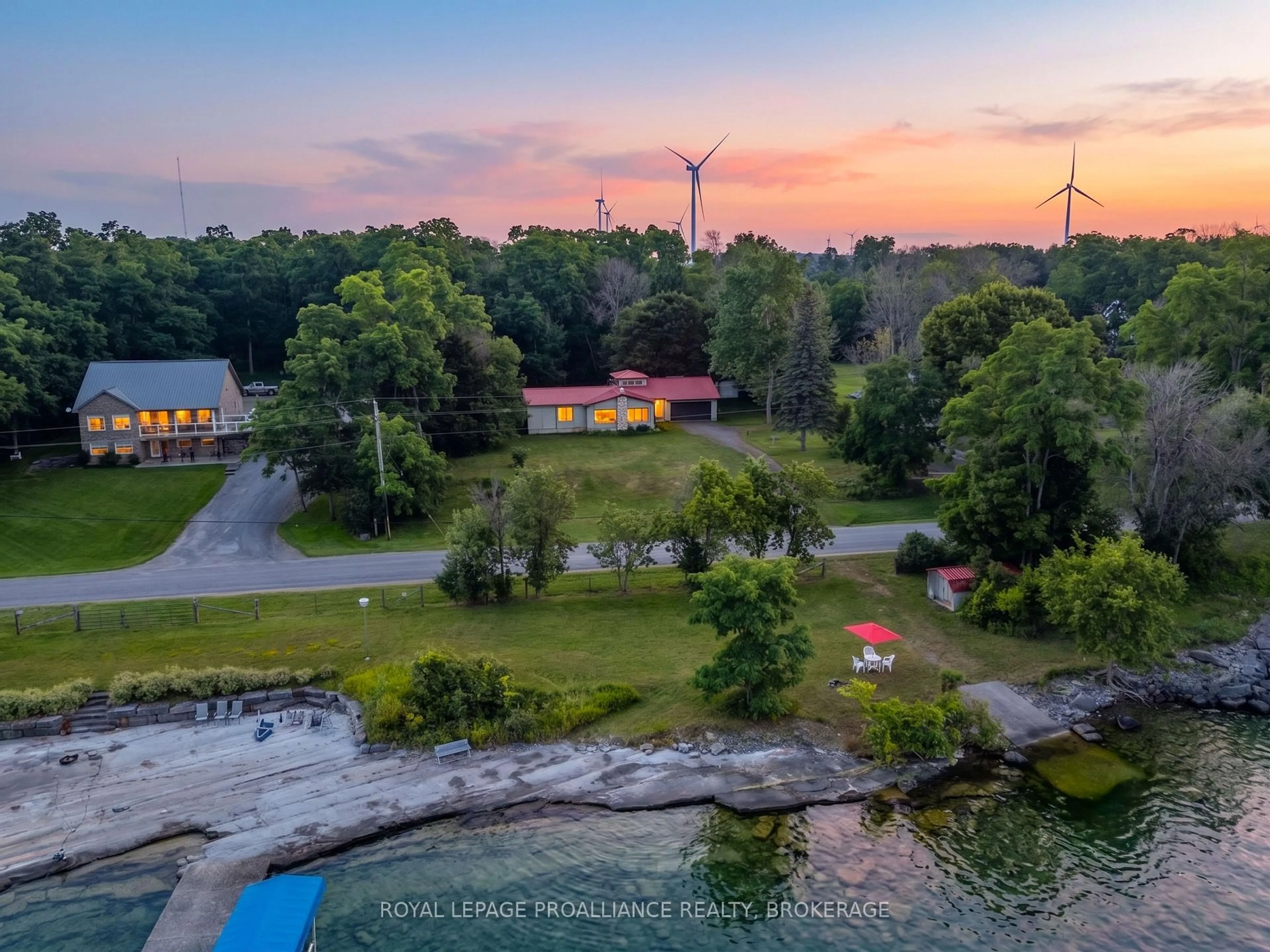 A pic from outside/outdoor area/front of a property/back of a property/a pic from drone, water/lake/river/ocean view for 1039 96 Highway, Wolfe Island Ontario K0H 2Y0