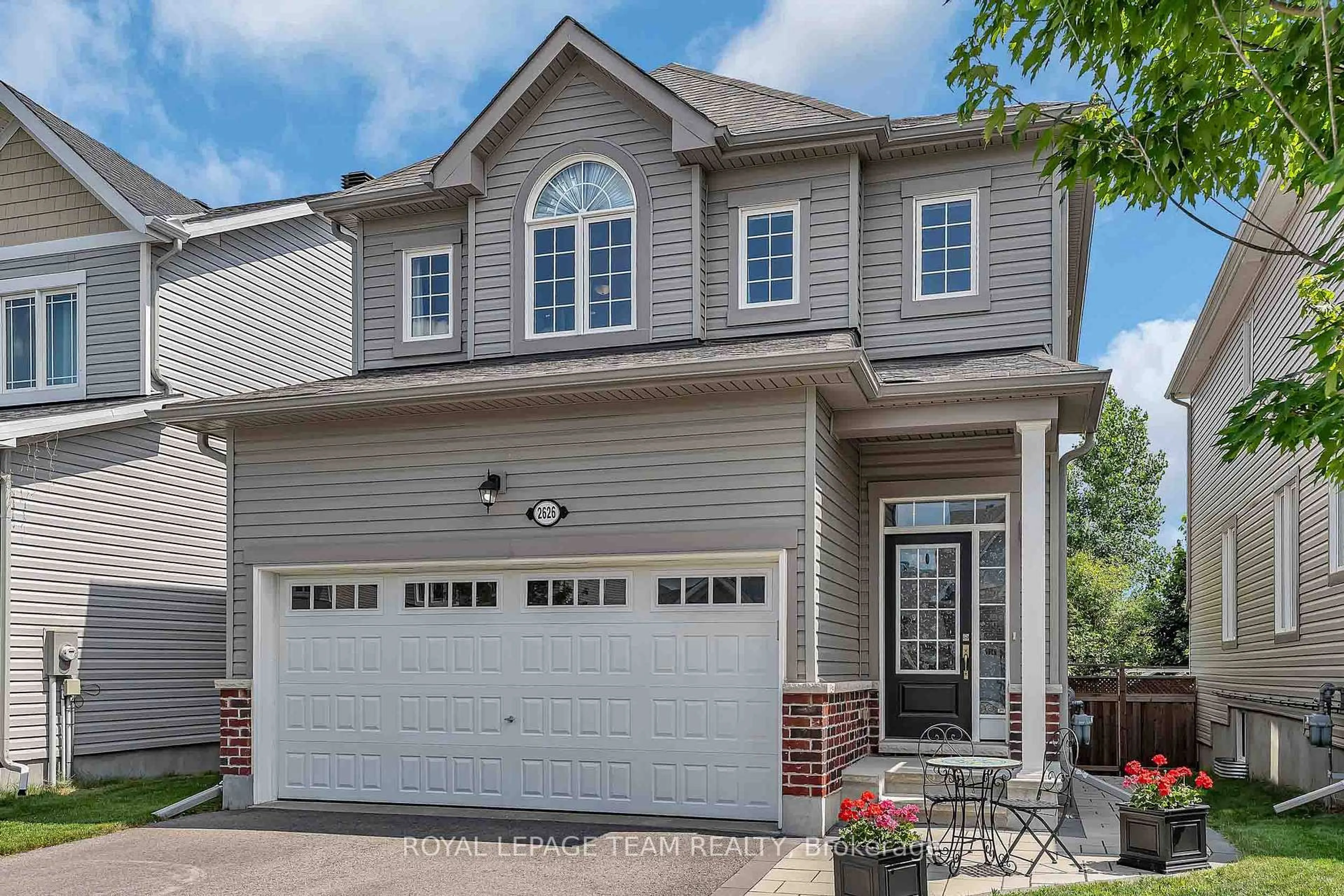 Home with vinyl exterior material, street for 2626 Tempo Dr, North Grenville Ontario K0G 1J0