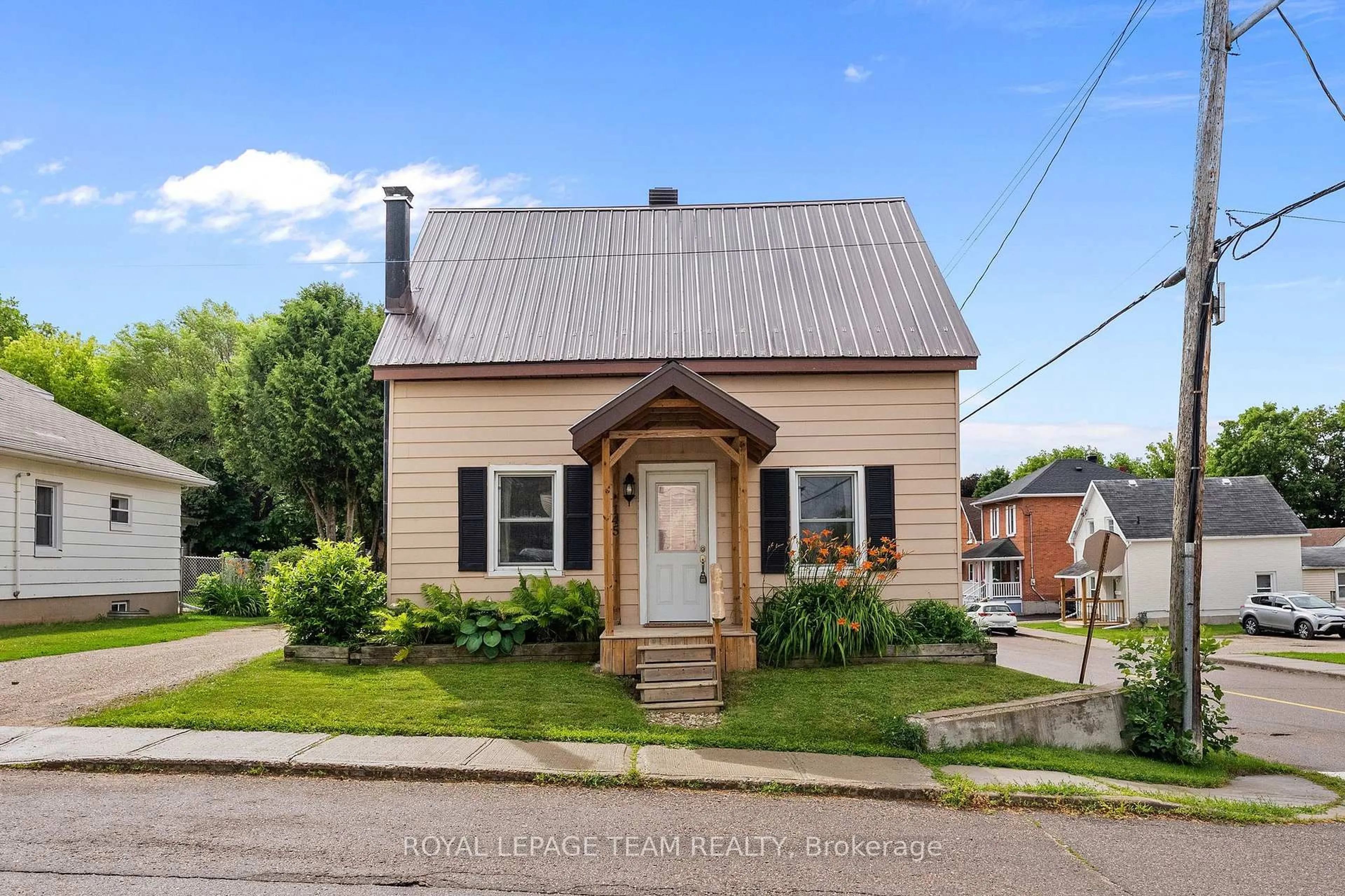 Home with brick exterior material, street for 145 Munroe Ave, Renfrew Ontario K7V 3L2