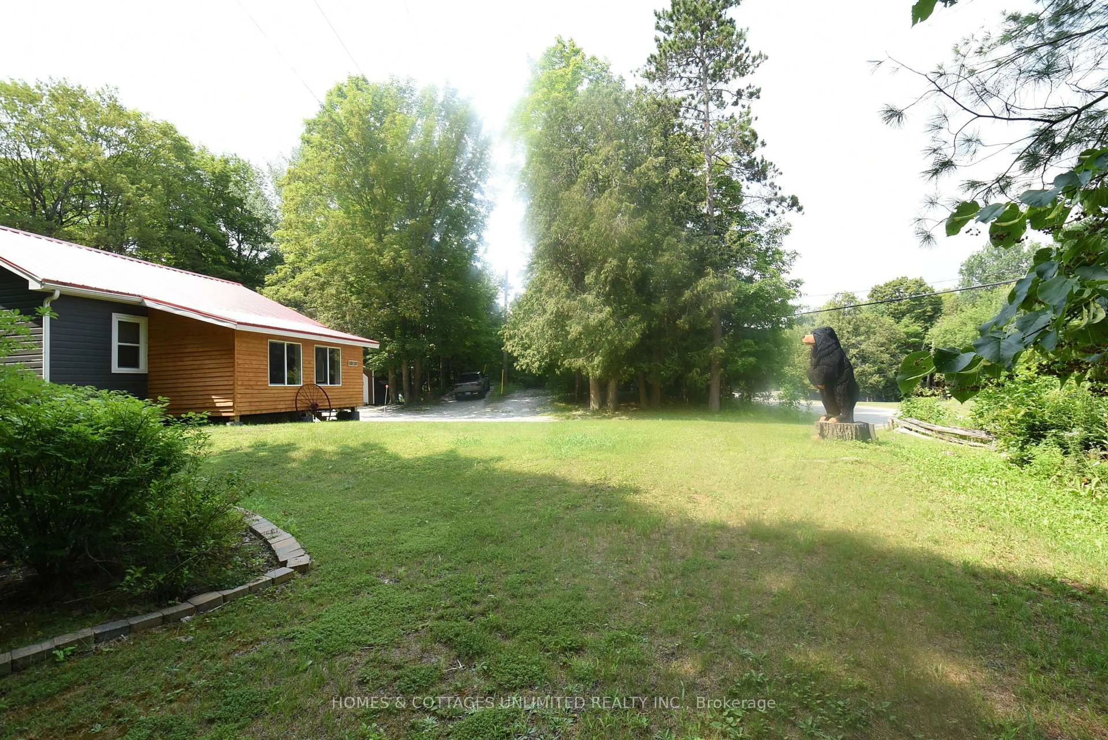 A pic from outside/outdoor area/front of a property/back of a property/a pic from drone, forest/trees view for 10110 509 Rd, Ompah Ontario K0H 2J0