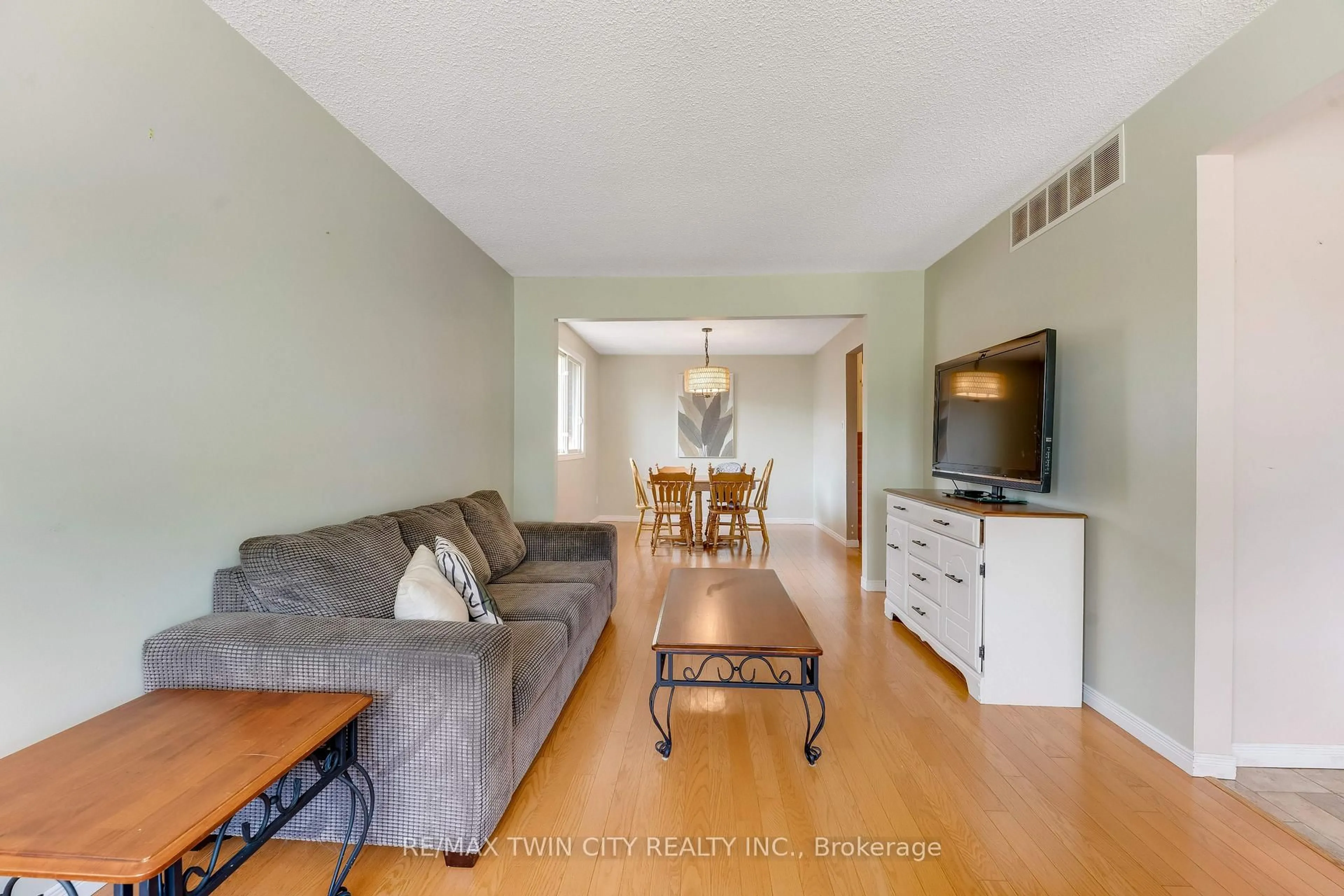Living room with furniture, wood/laminate floor for 131 Brierdale Dr, Kitchener Ontario N2A 3S8