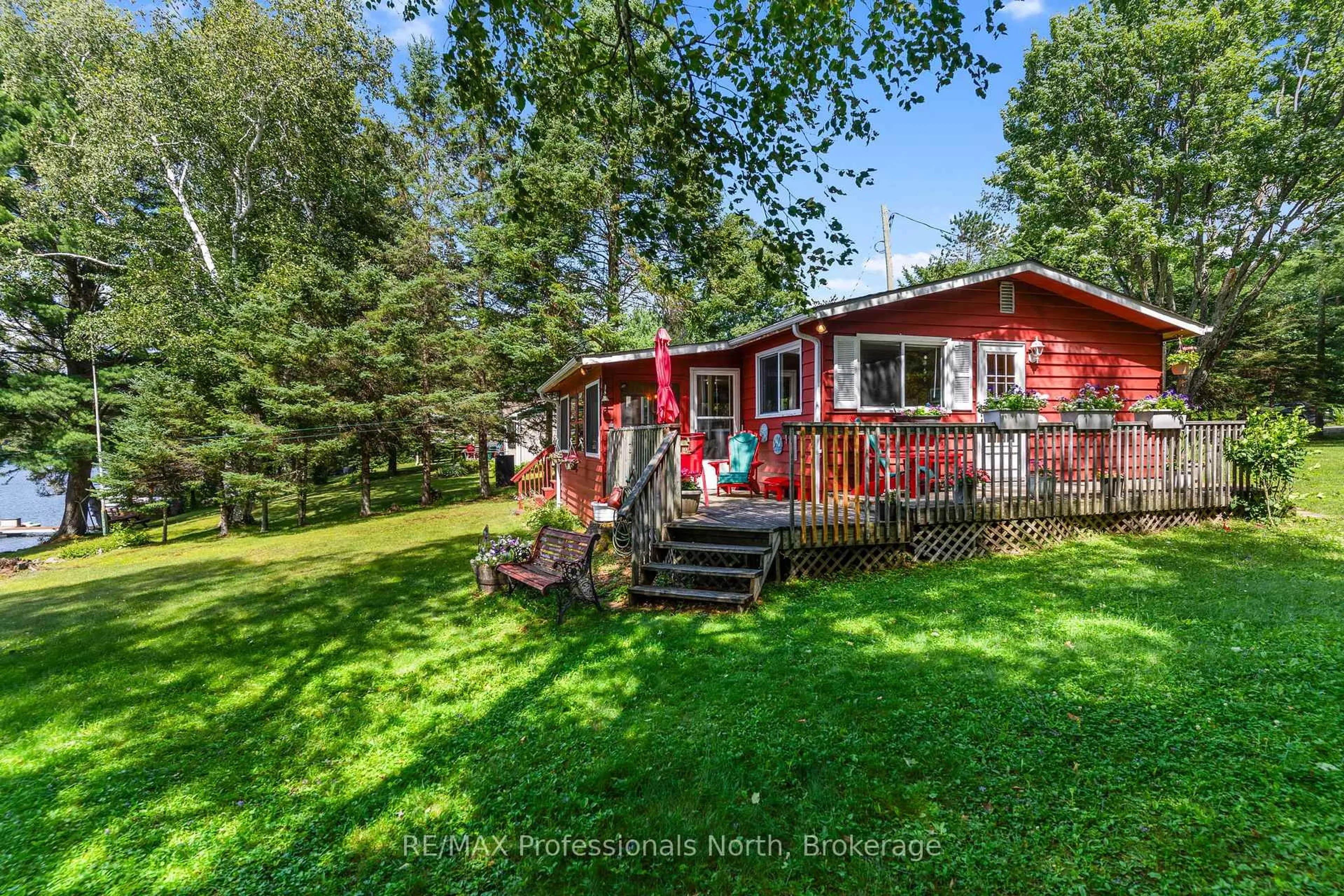 A pic from outside/outdoor area/front of a property/back of a property/a pic from drone, unknown for 1214 OLIVER Rd, Algonquin Highlands Ontario K0M 1S0