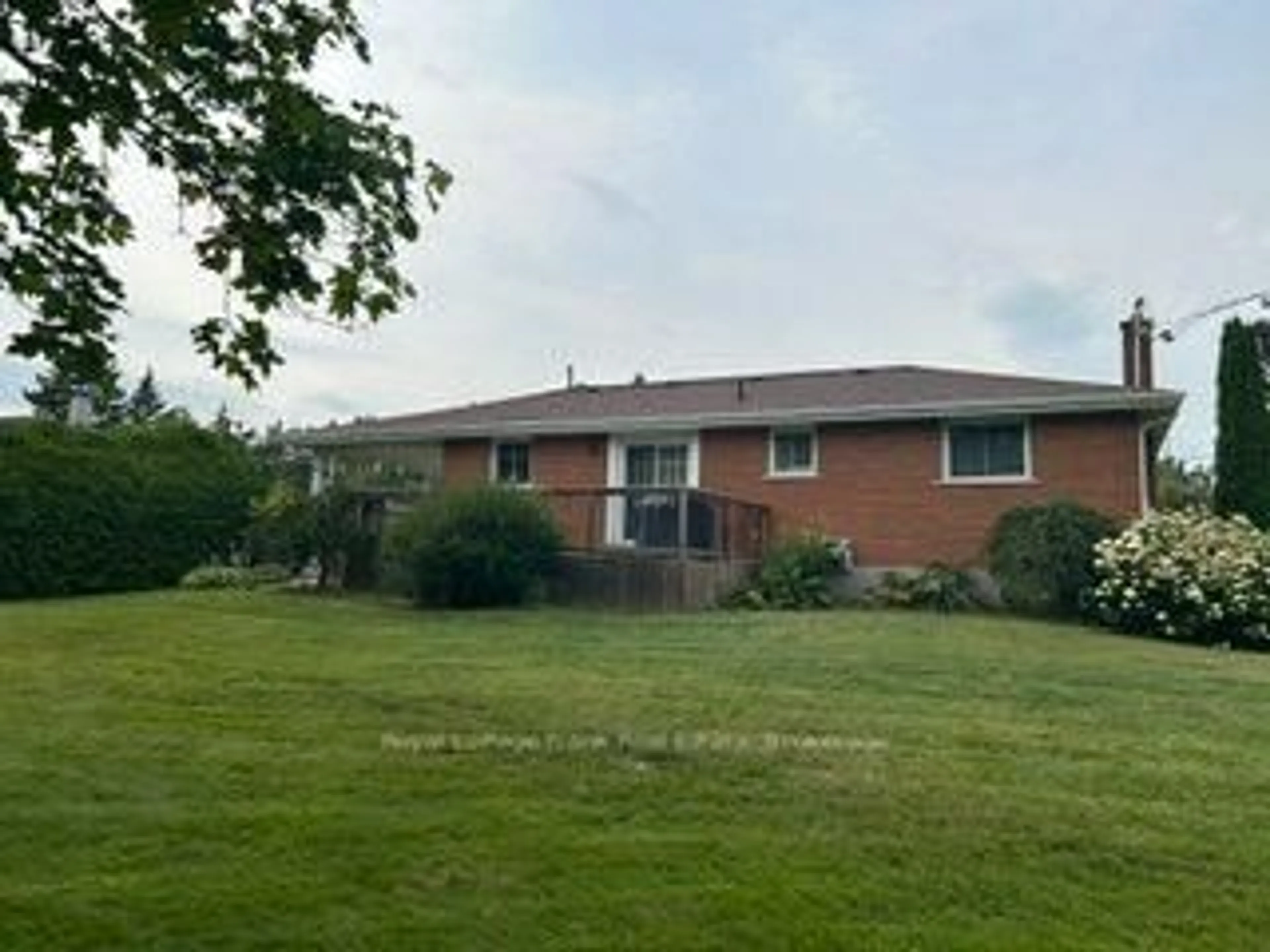 A pic from outside/outdoor area/front of a property/back of a property/a pic from drone, unknown for 701 Joseph St, Selwyn Ontario K0L 1T0