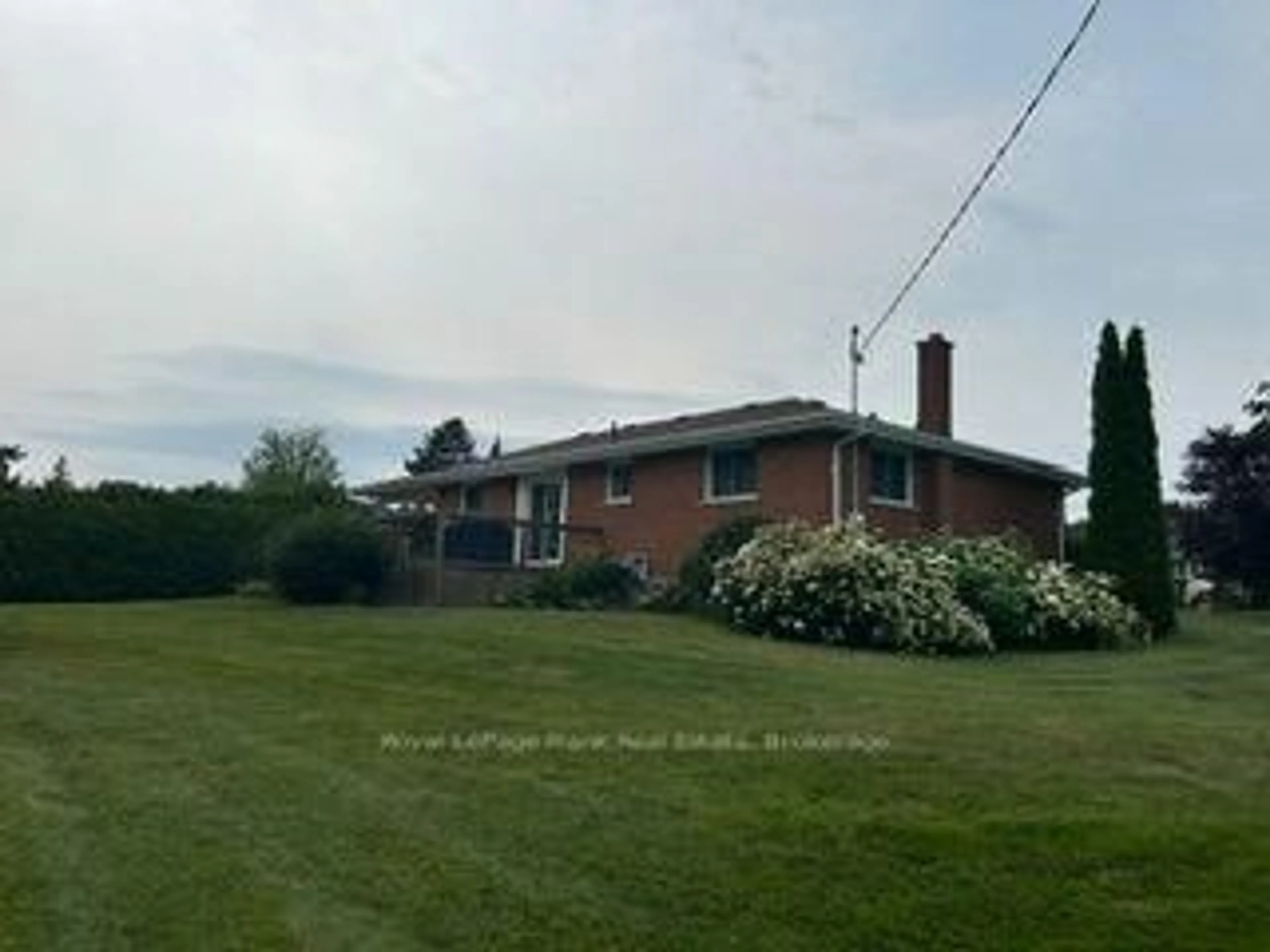 A pic from outside/outdoor area/front of a property/back of a property/a pic from drone, unknown for 701 Joseph St, Selwyn Ontario K0L 1T0