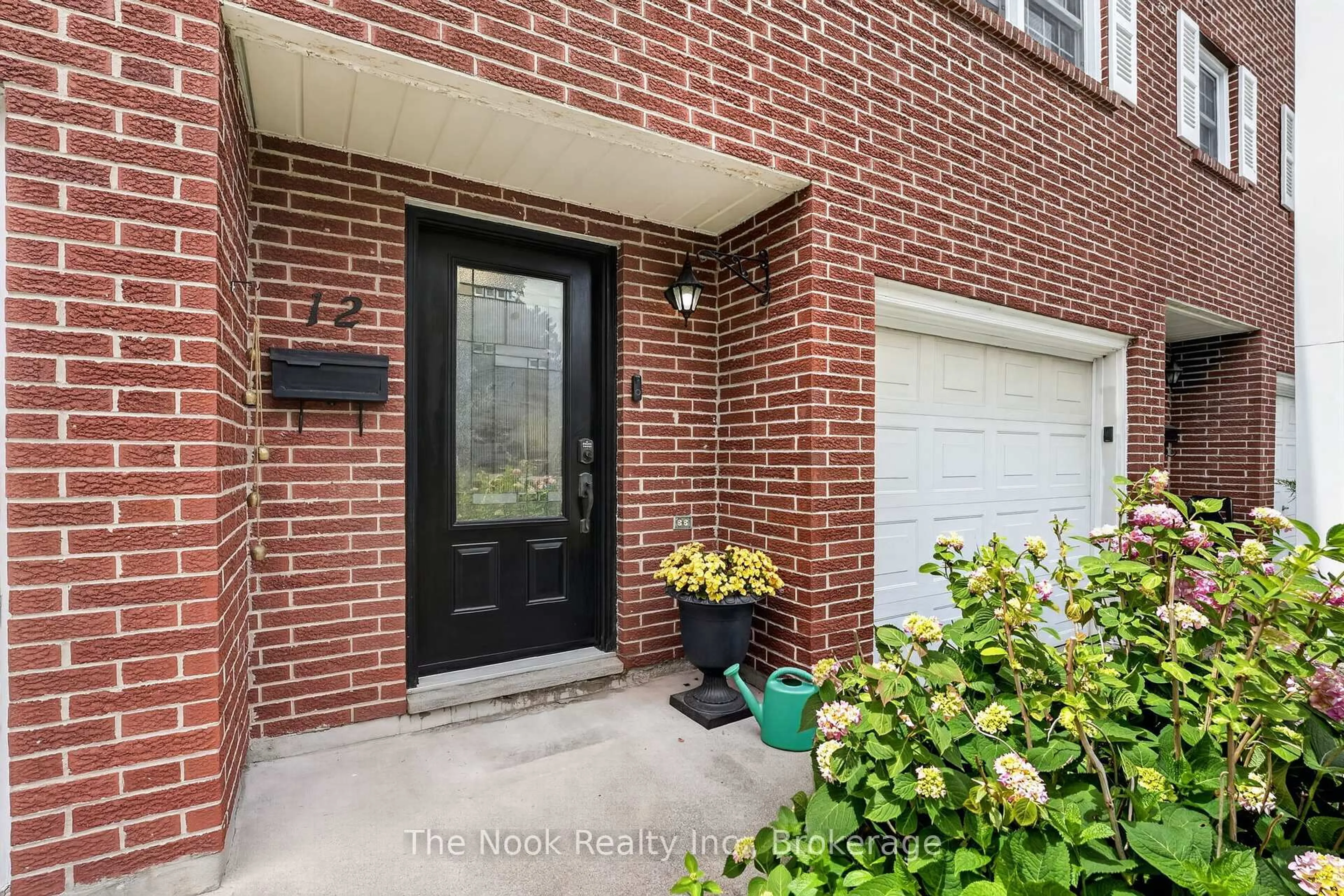Home with brick exterior material, street for 91 LIVINGSTON Ave #12, Grimsby Ontario L3M 1L4