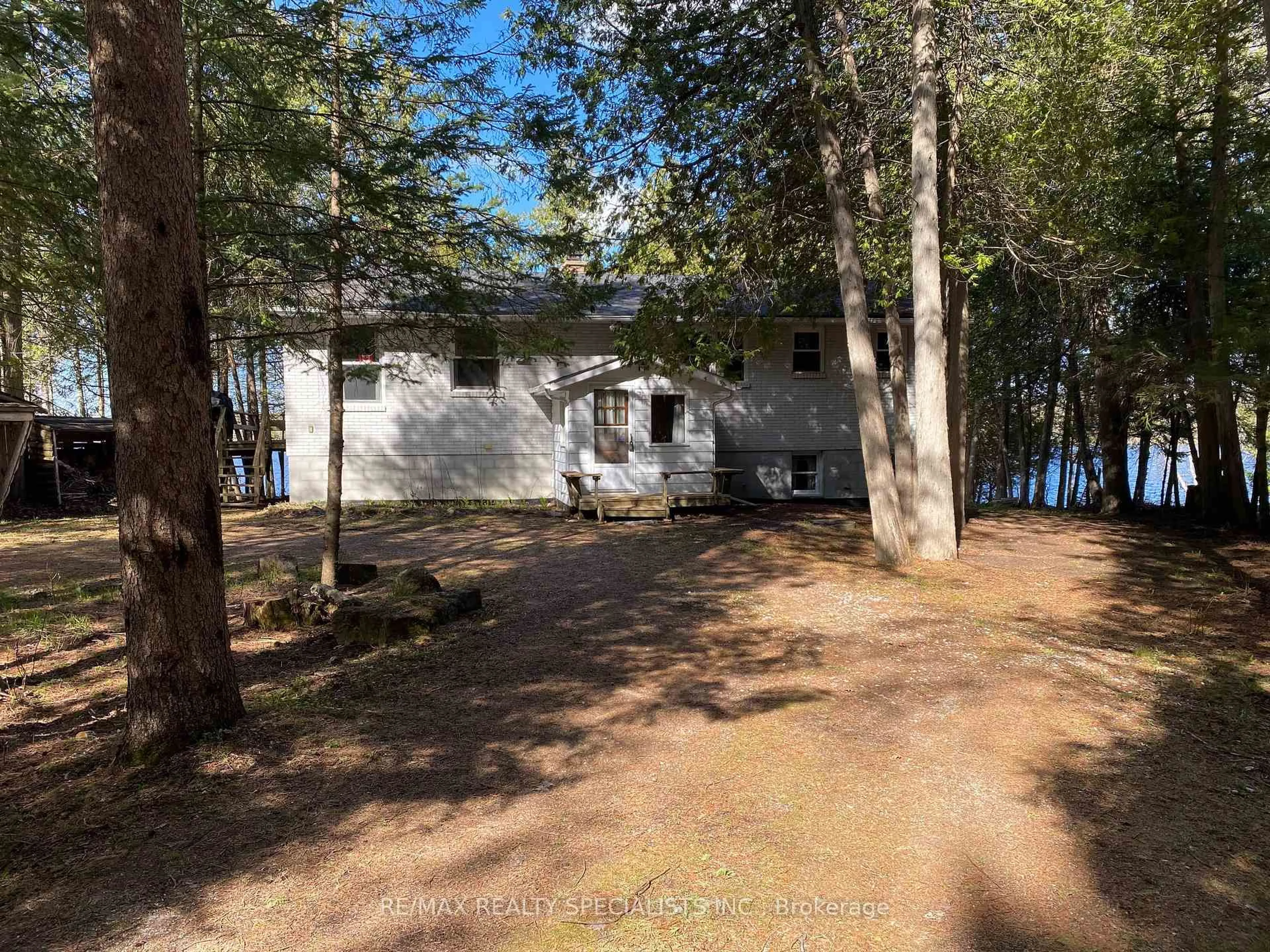 A pic from outside/outdoor area/front of a property/back of a property/a pic from drone, water/lake/river/ocean view for 384 Indian Point Rd, Kawartha Lakes Ontario K0M 1K0
