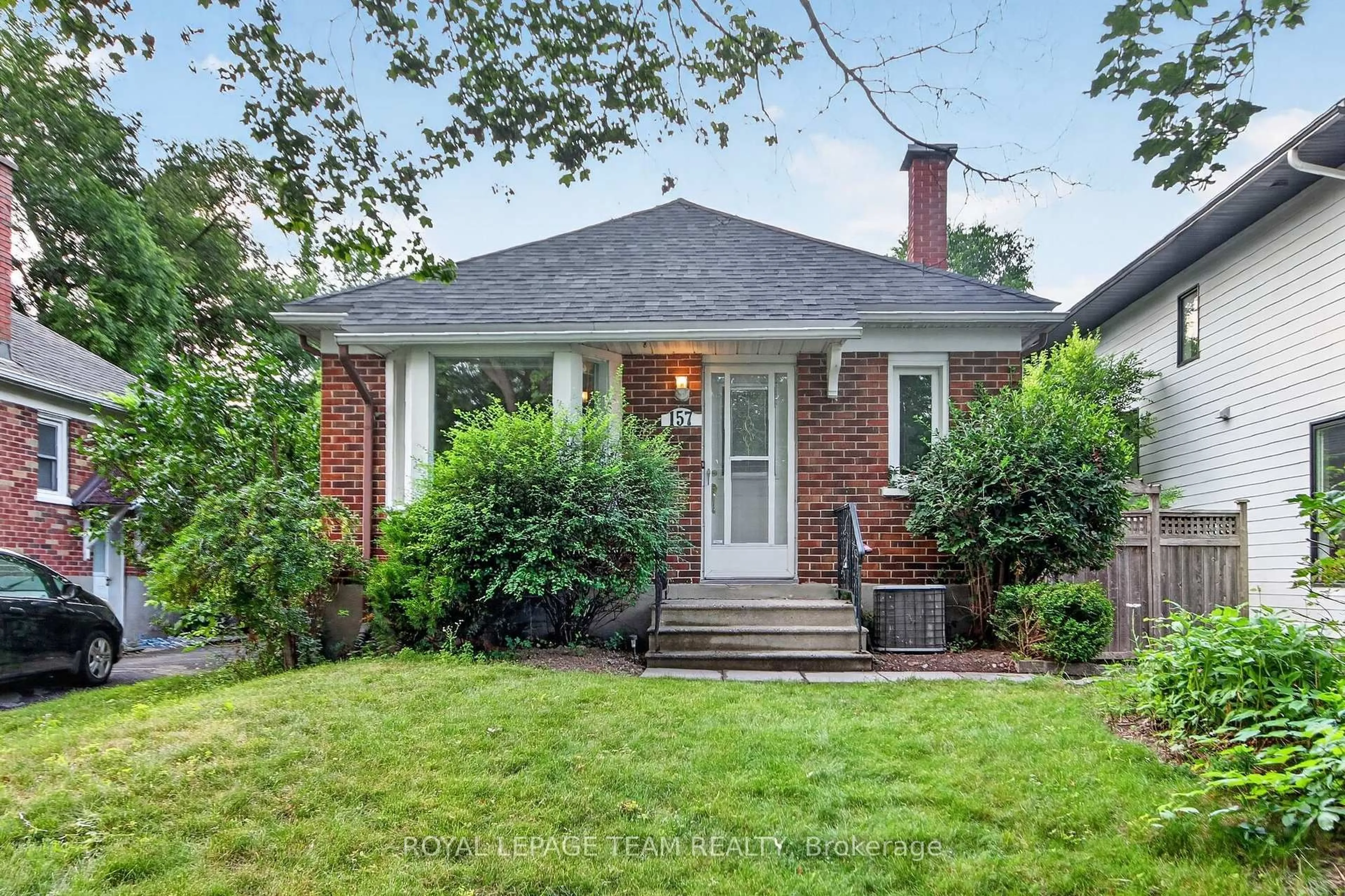 Home with brick exterior material, street for 157 Mulvihill Ave, Ottawa Ontario K1Z 6Y3