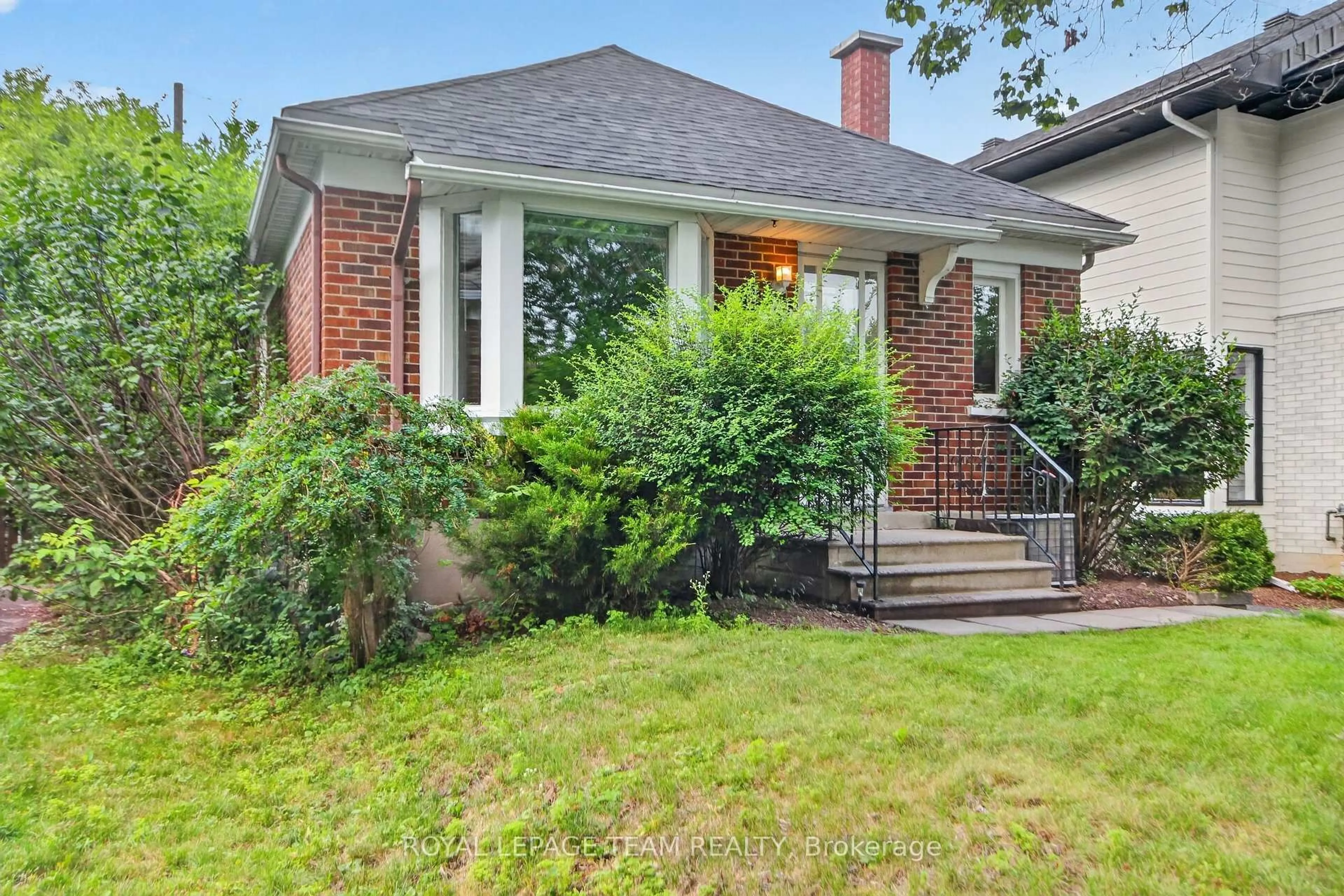 Home with brick exterior material, street for 157 Mulvihill Ave, Ottawa Ontario K1Z 6Y3